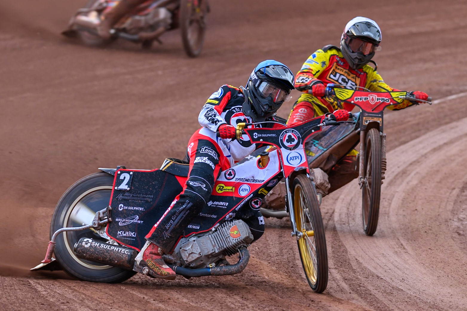 Norick Blödorn of Belle Vue Aces in Blue leading Ryan Douglas of Leicester Lions in White during the Rowe Motor Oil Premiership match between Belle Vue Aces and Leicester Lions at the National Speedway Stadium, Manchester on Monday 3rd August 2026. (Photo: Ian Charles | MI News)