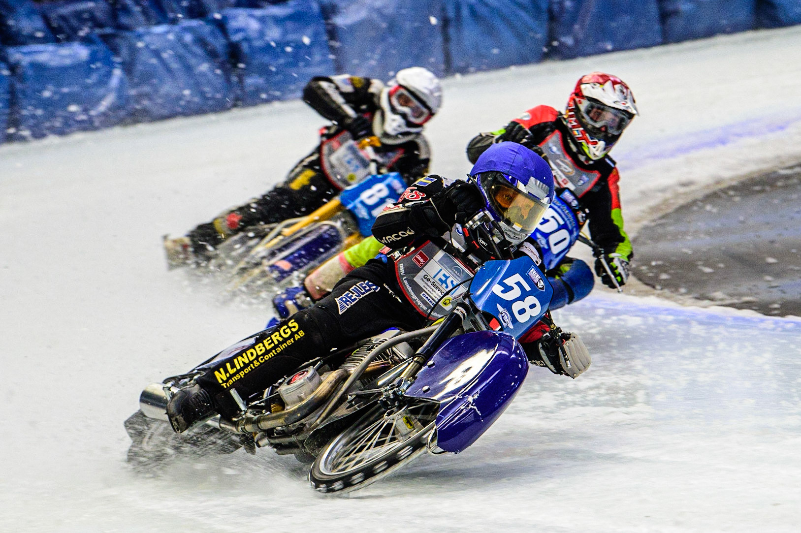 Stefan Svensson (58) (Blue) leads Harald Simon (50) (Red) and Jimmy Olsen (81) (White) during the Ice Speedway Gladiators World Championship Final 2 at Max-Aicher-Arena, Inzell, Germany on Sunday 19th March 2023. (Photo: Ian Charles | MI News)