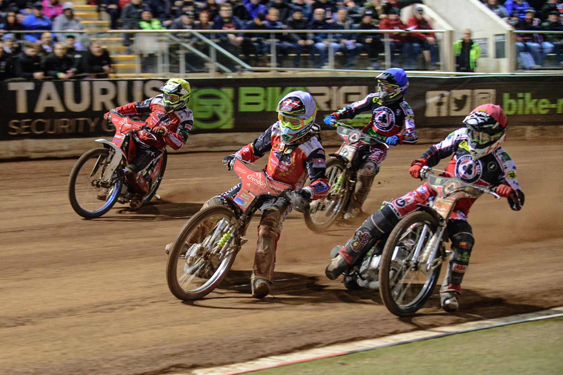 MANCHESTER, UK. OCT 11TH  Michael Palm Toft  (White) and Chris Harris  (Yellow) lead Dan Bewley (Red) and Charles Wright  (Blue) during the SGB Premiership Grand Final 1st Leg between Belle Vue Aces and Peterborough Panthers at the National Speedway Stadium, Manchester on Monday 11th October 2021. (Credit: Ian Charles | MI News)