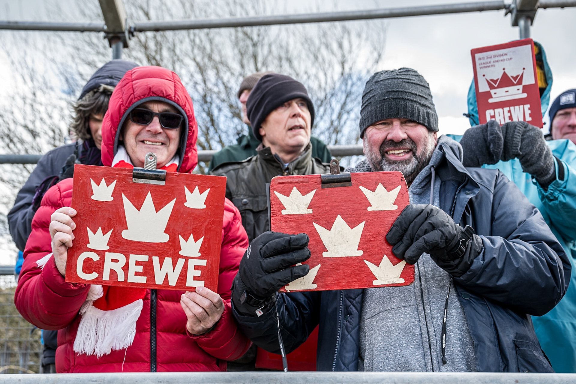 Crewe Kings fans with their programme boats during the Regina Chains Fours at Buxton Speedway, Buxton on Sunday 5th April 2026. (Photo: Ian Charles | MI News)