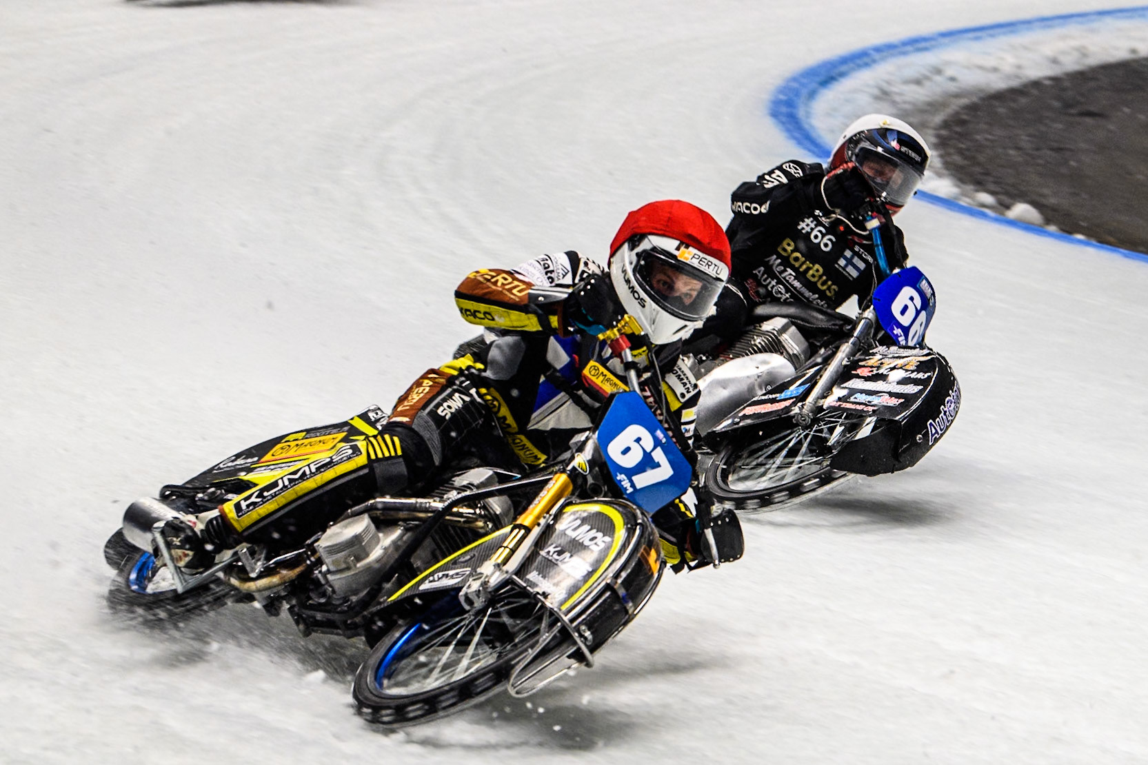 Heikki Huusko (67) of Finland in Red leading Aki Ala-Riihimäki (66) of Finland in White during the Ice Speedway Gladiators World Championship Final 1 at Max-Aicher-Arena, Inzell on Saturday 15th March 2025. (Photo: Ian Charles | MI News)