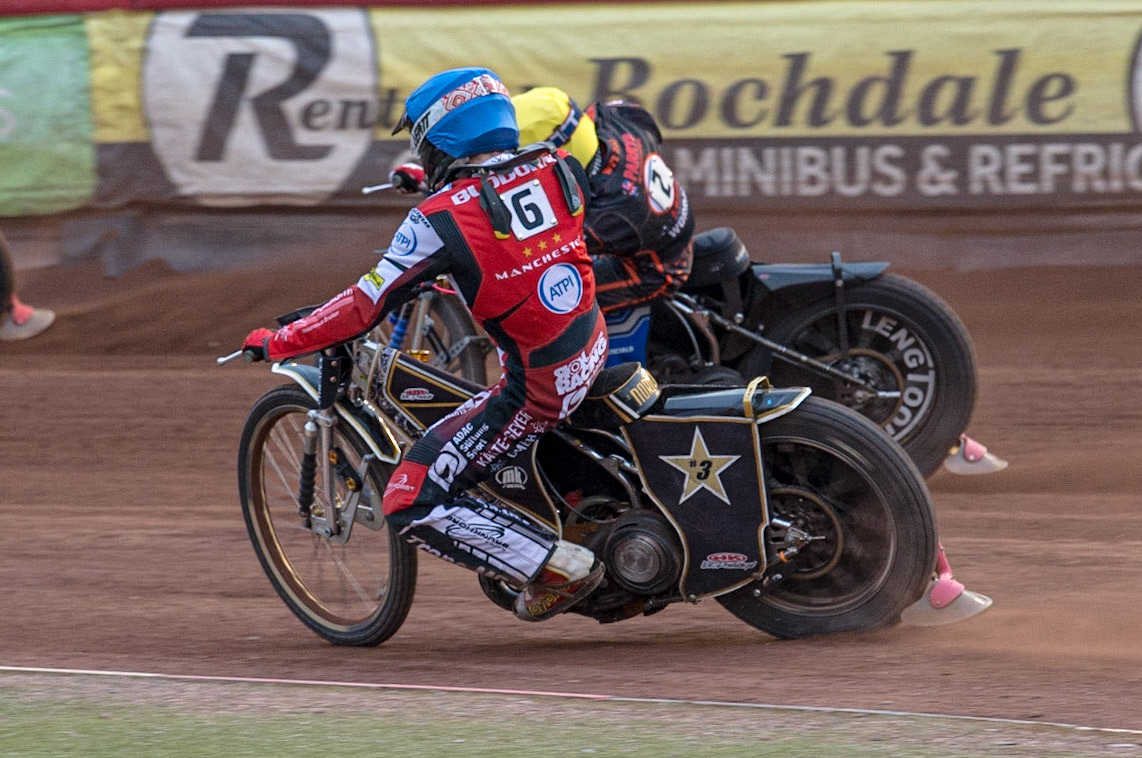 MANCHESTER, UK. JUN 13TH Norick Blödorn  (Blue)  inside Steve Worrall  (Yellow) during the SGB Premiership match between Belle Vue Aces and Wolverhampton  Wolves at the National Speedway Stadium, Manchester on Monday 13th June 2022. (Credit: Ian Charles | MI News)