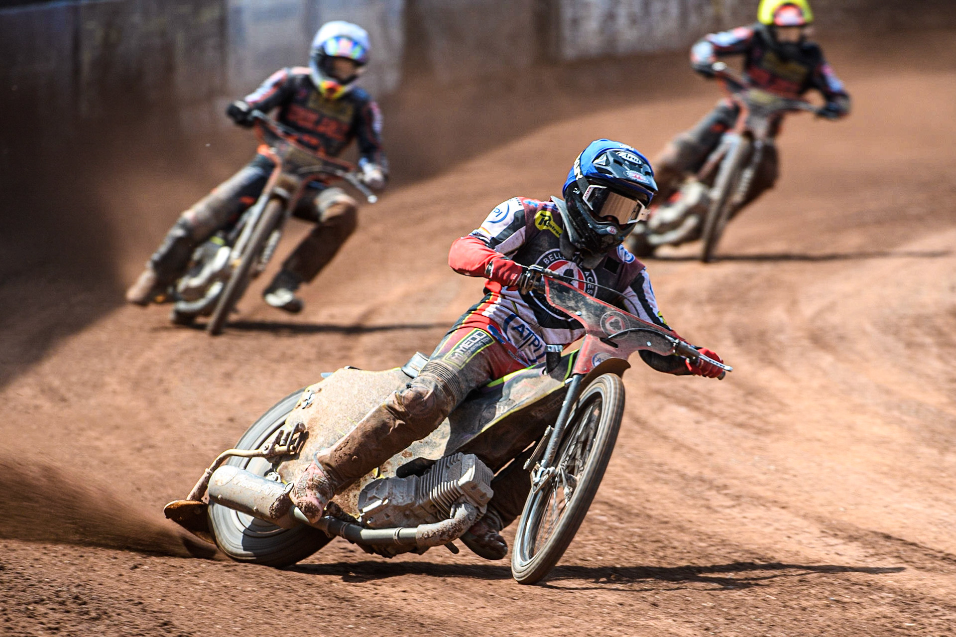 Tom Brennan (Blue) leads  Leon Flint (White) and Zach Cook (Yellow) during the Sports Insure Premiership match between Belle Vue Aces and Wolverhampton Wolves at the National Speedway Stadium, Manchester on Monday 29th May 2023. (Photo: Ian Charles | MI News)