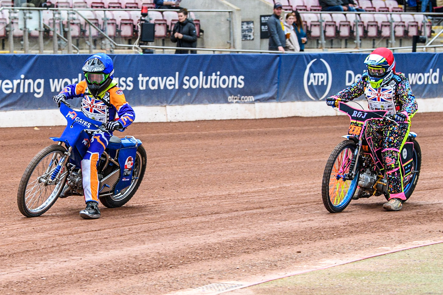 Adam Sydyk  (Blue) leads Tia May Brant (Red) during the British Youth Championships at the National Speedway Stadium, Manchester on Friday 12th May 2023. (Photo: Ian Charles | MI News)