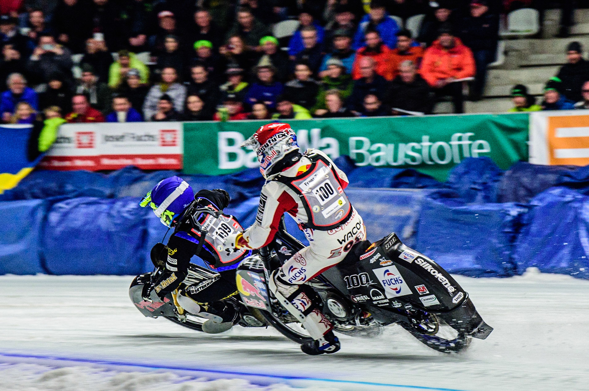 Martin Haarahiltunen (199) (Blue) shuts down Franz Zorn (100) (Red) during the Ice Speedway Gladiators World Championship Final 1 at Max-Aicher-Arena, Inzell, Germany on Saturday 18th March 2023. (Photo: Ian Charles | MI News)
