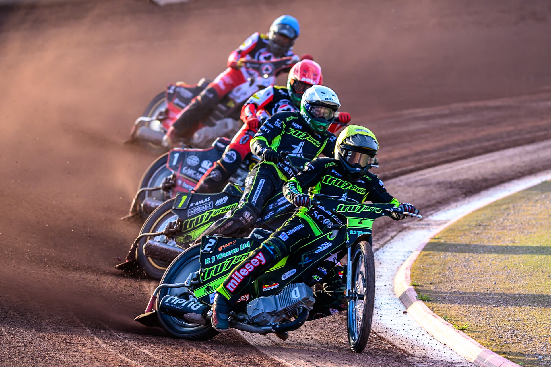 Danny King of Ipswich Witches  in Yellow leading Jason Doyle of Ipswich Witches  in White, Brady Kurtz of Belle Vue Aces  in Red and Norick Blödorn of Belle Vue Aces  in Blue during the Rowe Motor Oil Premiership match between Belle Vue Aces and Ipswich Witches at the National Speedway Stadium, Manchester on Monday 4th August 2025. (Photo: Ian Charles | MI News)