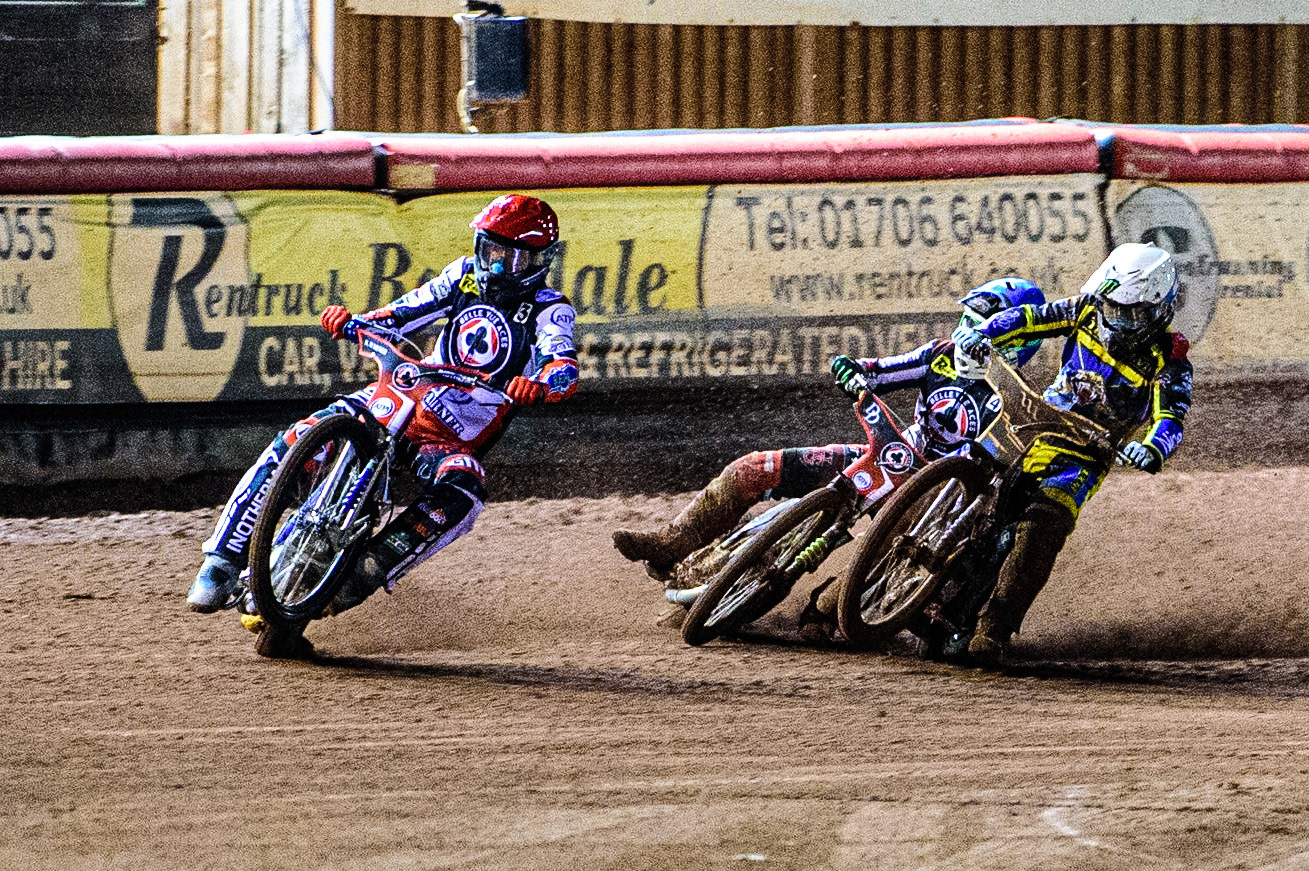 Jack Holder  (White) collides with Charles Wright  (Blue) behind Matej Zagar  (Red) during the SGB Premiership Grand Final 1st leg between Belle Vue Aces and Sheffield Tigers at the National Speedway Stadium, Manchester on Monday 10th October 2022. (Credit: Ian Charles | MI News)