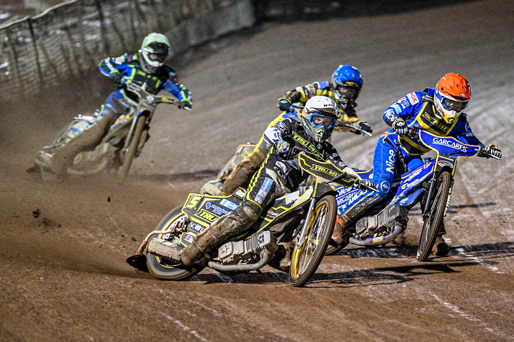 Jason Doyle (White) outside Robert Lambert (Red) with Kyle Howarth (Blue) behind during the Sports Insure Premiership Grand Final Second Leg match between Sheffield Tigers and Ipswich Witches at Owlerton Stadium, Sheffield on Thursday 5th October 2023. (Photo: Ian Charles | MI News)