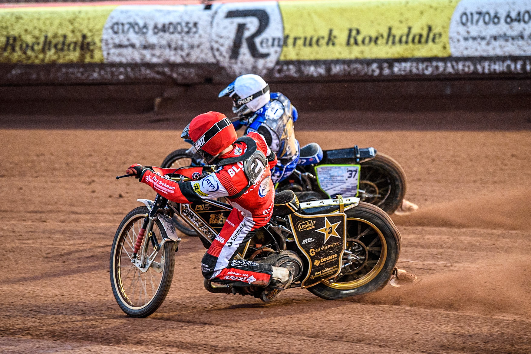 Belle Vue Aces' Norick Blodorn  in Red rides inside Kings Lynn Stars' Guest Rider Chris Harris  in White during the Rowe Motor Oil Premiership match between Belle Vue Aces and King's Lynn Stars at the National Speedway Stadium, Manchester on Monday 12th August 2024. (Photo: Ian Charles | MI News)