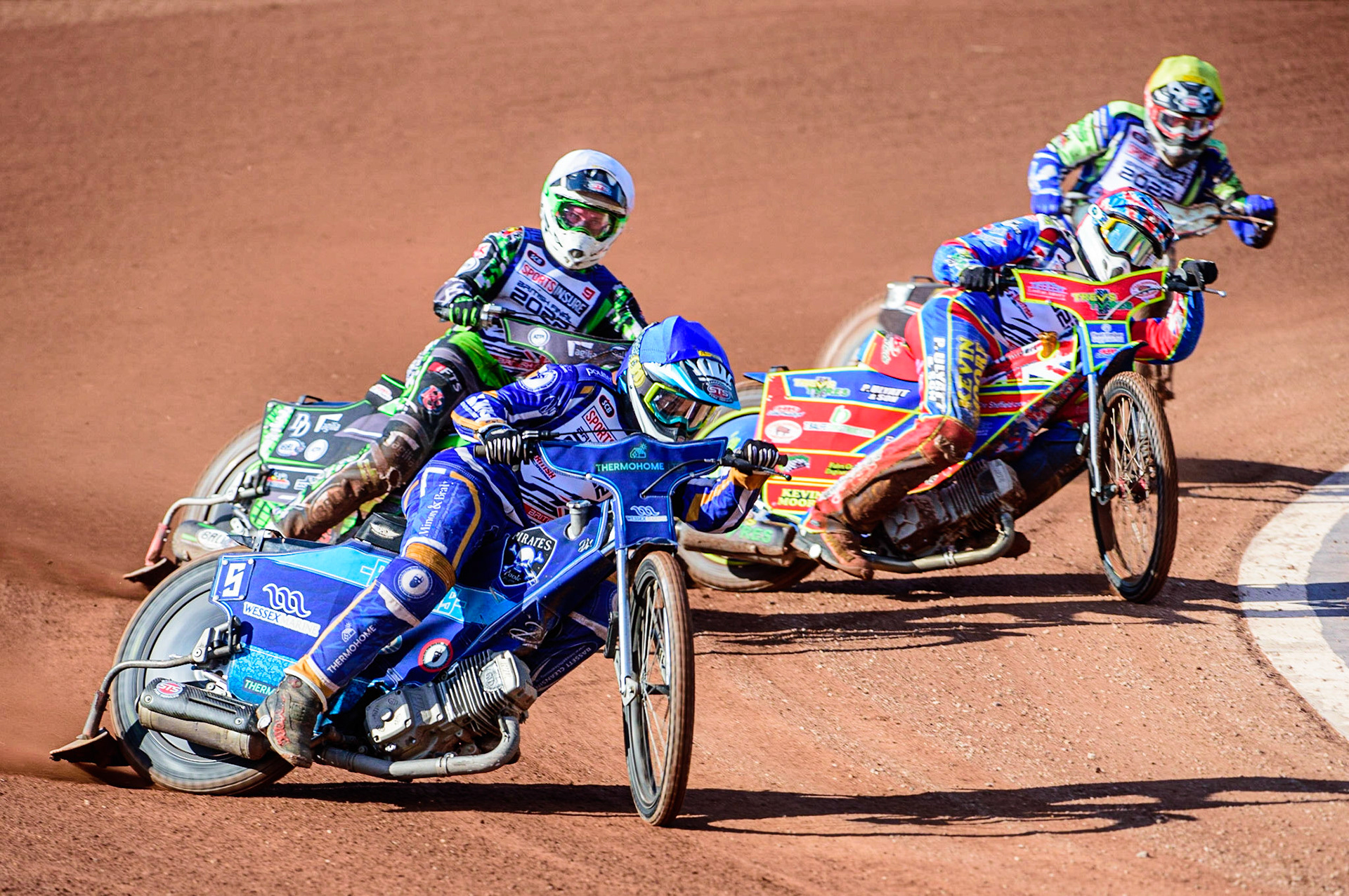 Richard Lawson leads Charles Wright  (White) Simon Lambert  (Red) and Richie Worrall  (Yellow) during the Sports Insure British Speedway Final, at the National Speedway Stadium, Manchester, on Sunday 18th September 2022. (Credit: Ian Charles | MI News )
