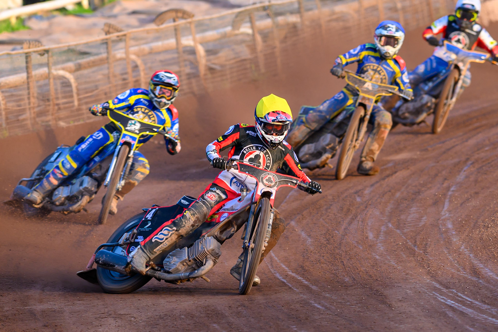 Zach Cook of Belle Vue Aces in Yellow leading Josh Pickering of Sheffield Tigers in Red, Jye Etheridge of Sheffield Tigers in Blue and Justin Sedgman, Guest Rider for Belle Vue Aces in Red during the Rowe Motor Oil Premiership match between Sheffield Tigers and Belle Vue Aces at Owlerton Stadium, Sheffield on Monday 25th May 2026. (Photo: Ian Charles | MI News)