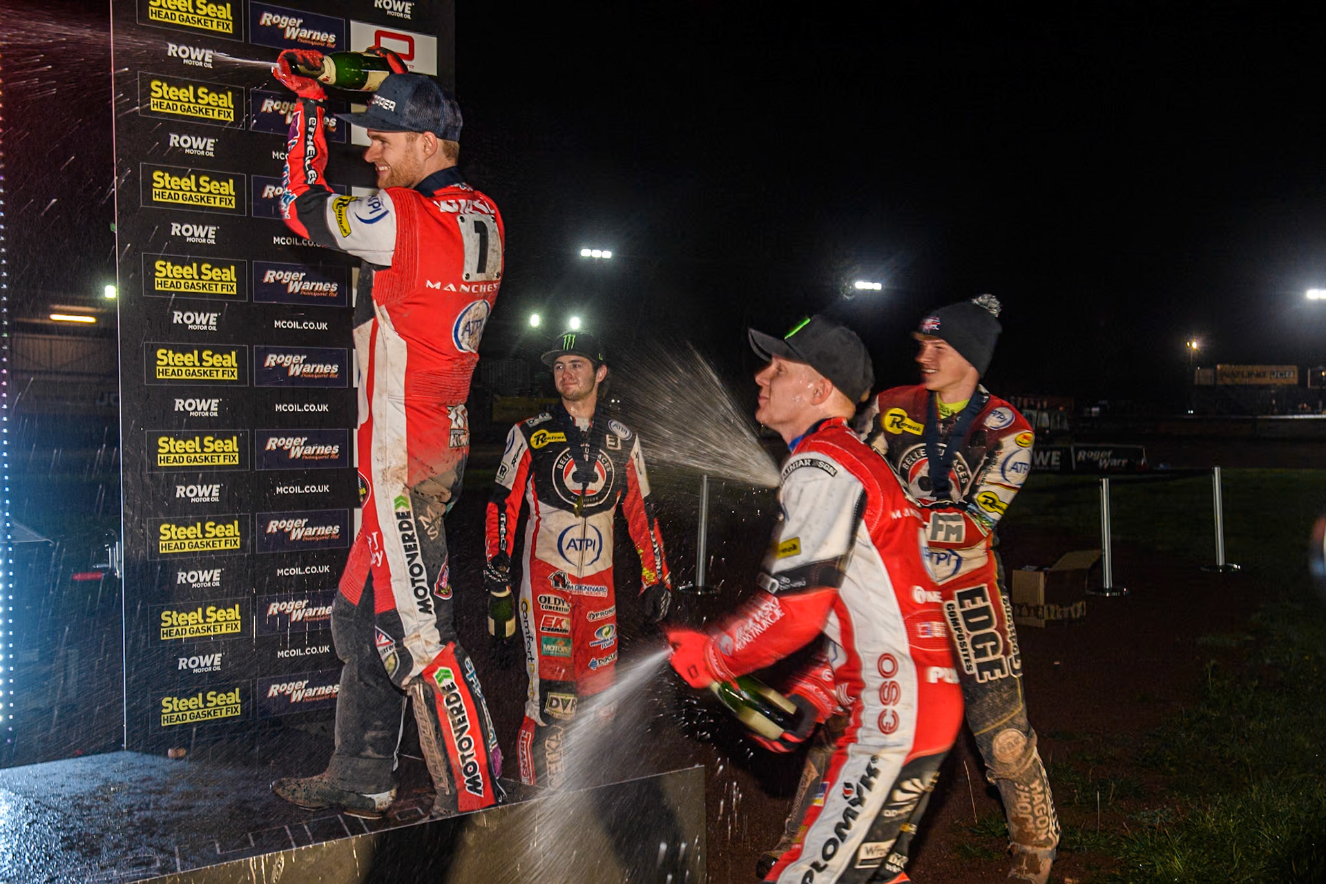 Belle Vue riders spray the champagne during the Rowe Motor Oil Premiership Grand Final 2nd Leg between Leicester Lions and Belle Vue Aces at the Pidcock Motorcycles Arena, Leicester on Thursday 26th September 2024. (Photo: Ian Charles | MI News)