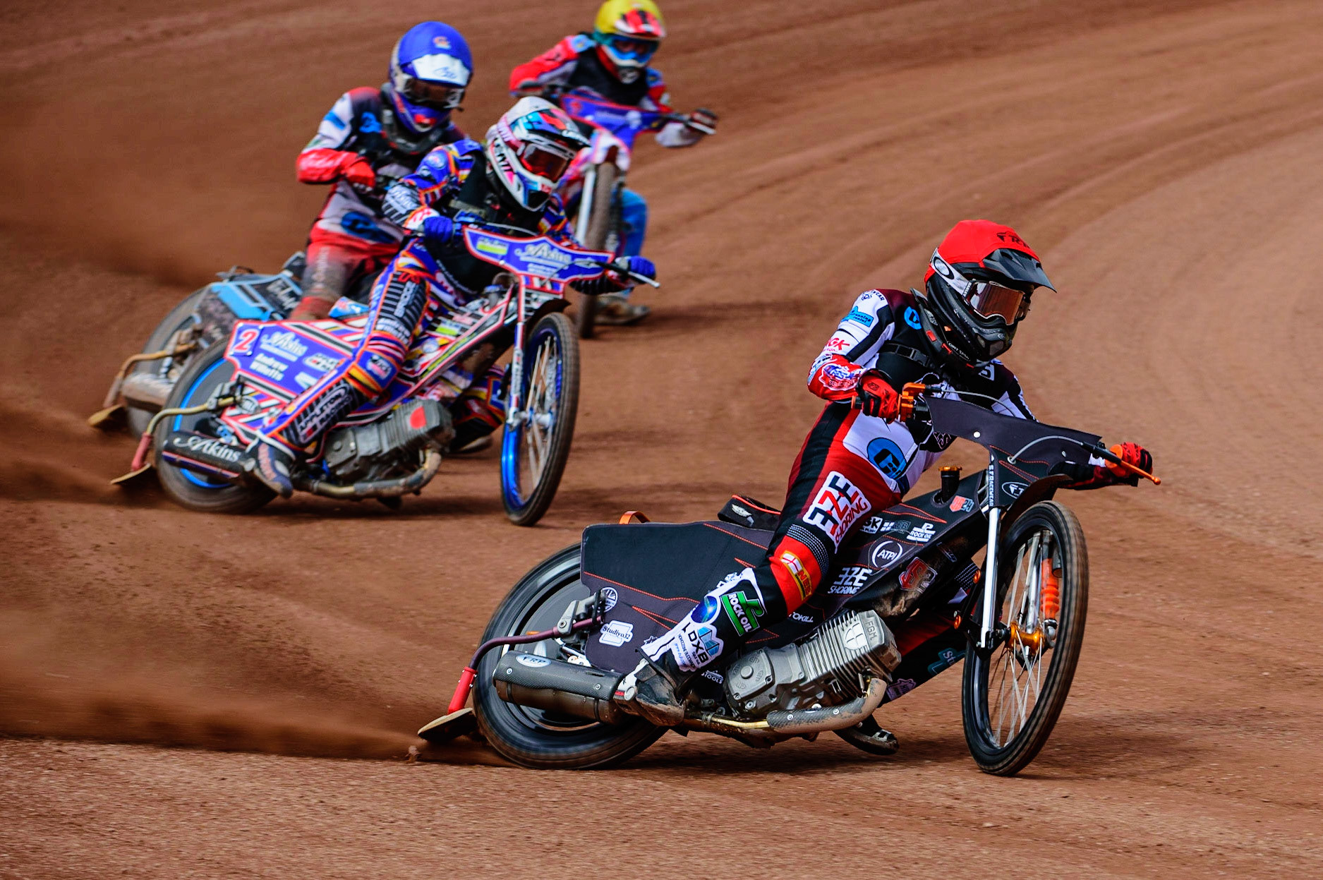 MANCHESTER, UK.  JUN 3RD Jack Smith  (Red) leads Henry Atkins  (White) Freddy Hodder  (Blue) and Jacob Fellows  (Yellow)  during the National Development League match between Belle Vue Colts and Oxford Chargers at the National Speedway Stadium, Manchester on Friday 3rd June 2022. (Credit: Ian Charles | MI News)