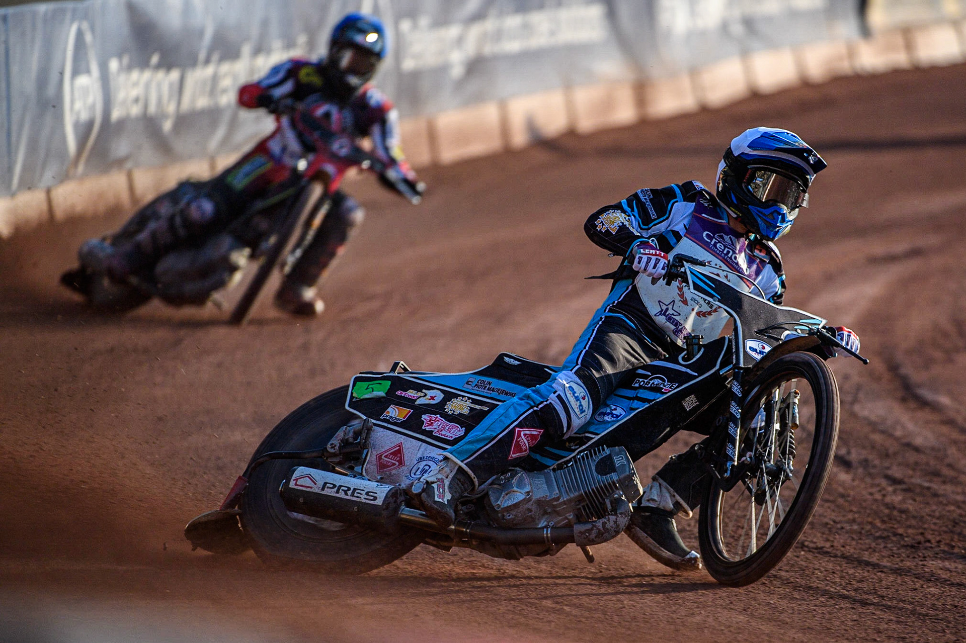 Vadim Tarasenko (White) leads Tom Brennan (Blue) during the Sports Insure Premiership match between Belle Vue Aces and Peterborough at the National Speedway Stadium, Manchester on Monday 19th June 2023. (Photo: Ian Charles | MI News)