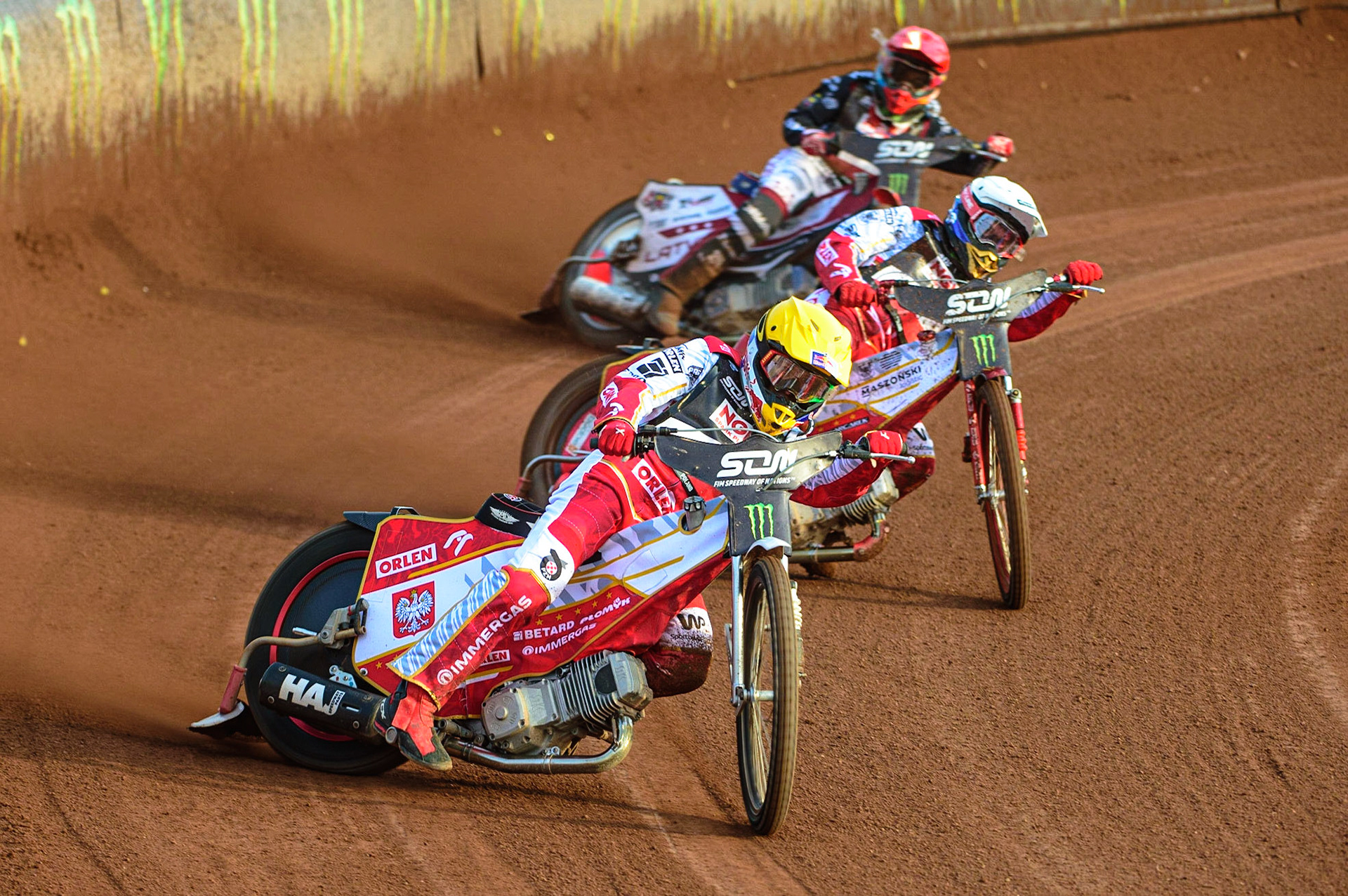 MANCHESTER, UK. OCT 16TH Maciej Janowski of Poland (Yellow) leads team-mate Bartosz Zmarzlik of Poland (White) and Andzejs Lebedevs of Latvia (Red) during the Monster Energy FIM Speedway of Nations at the National Speedway Stadium, Manchester on Saturday  16th October 2021. (Credit: Ian Charles | MI News)