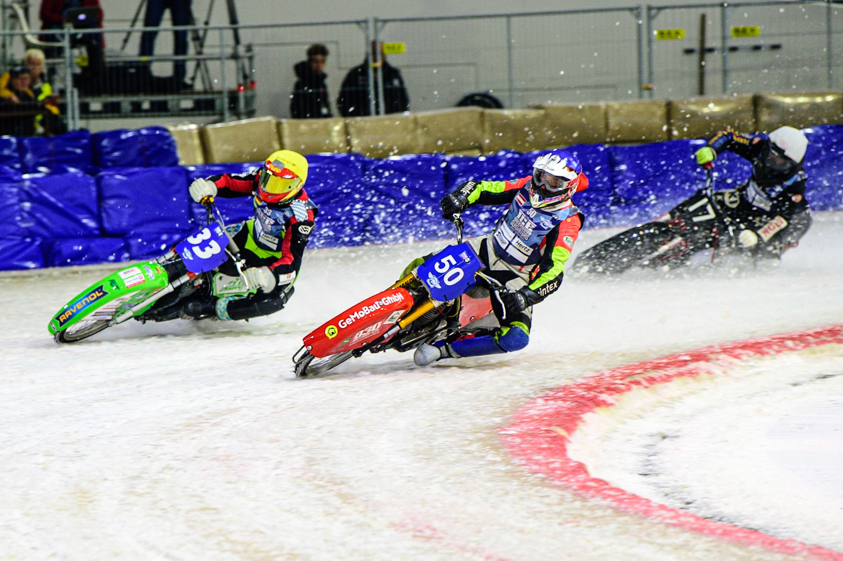 HEERENVEEN, NL. Harald Simon (50) (Blue) leads Johann Weber (33)  (Yellow) and Henri Ahlbom (17) (White)  during the FIM Ice Speedway Gladiators World Championship Final 4 at Ice Rink Thialf, Heerenveen on Sunday  3 April 2022. (Credit: Ian Charles | MI News)