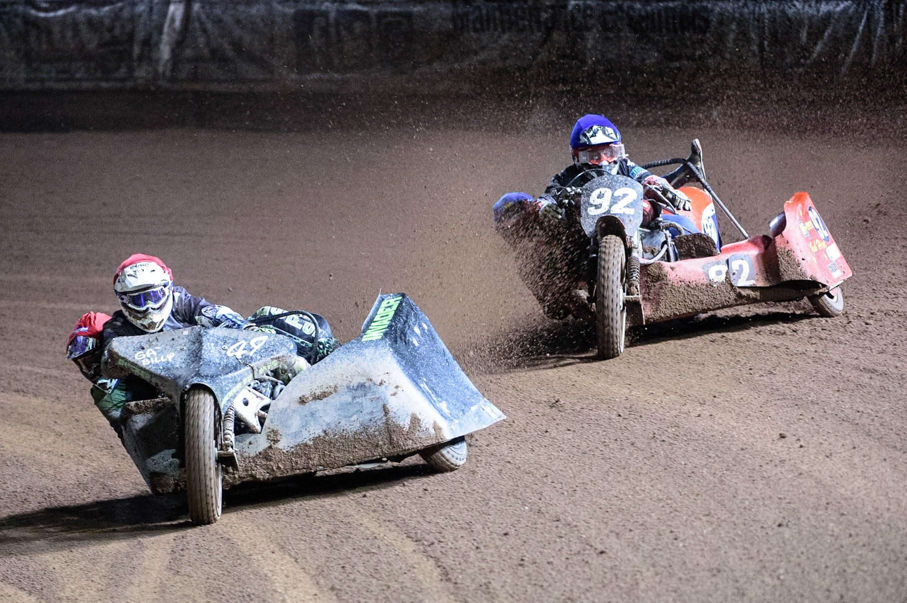 MANCHESTER, UK. OCT 30TH   Gareth Winterburn &amp; Bradley Atkinson  (Red) leads Paul Whitelam &amp; Richard Webb  (Blue) during the Manchester Masters Sidecar Speedway and Flat Track Racing at the National Speedway Stadium, Manchester on Saturday 30th October 2021. (Credit: Ian Charles | MI News)