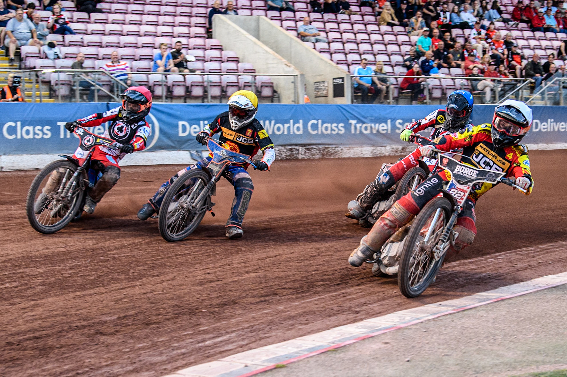 Leicester Lions' Luke Becker in White leading Belle Vue Aces' Connor Bailey in Blue, Leicester Lions' Guest rider Luke Killeen in Yellow and Belle Vue Aces' Ben Cook in Redduring the Rowe Motor Oil Premiership match between Belle Vue Aces and Leicester Lions at the National Speedway Stadium, Manchester on Monday 24th June 2024. (Photo: Ian Charles | MI News)