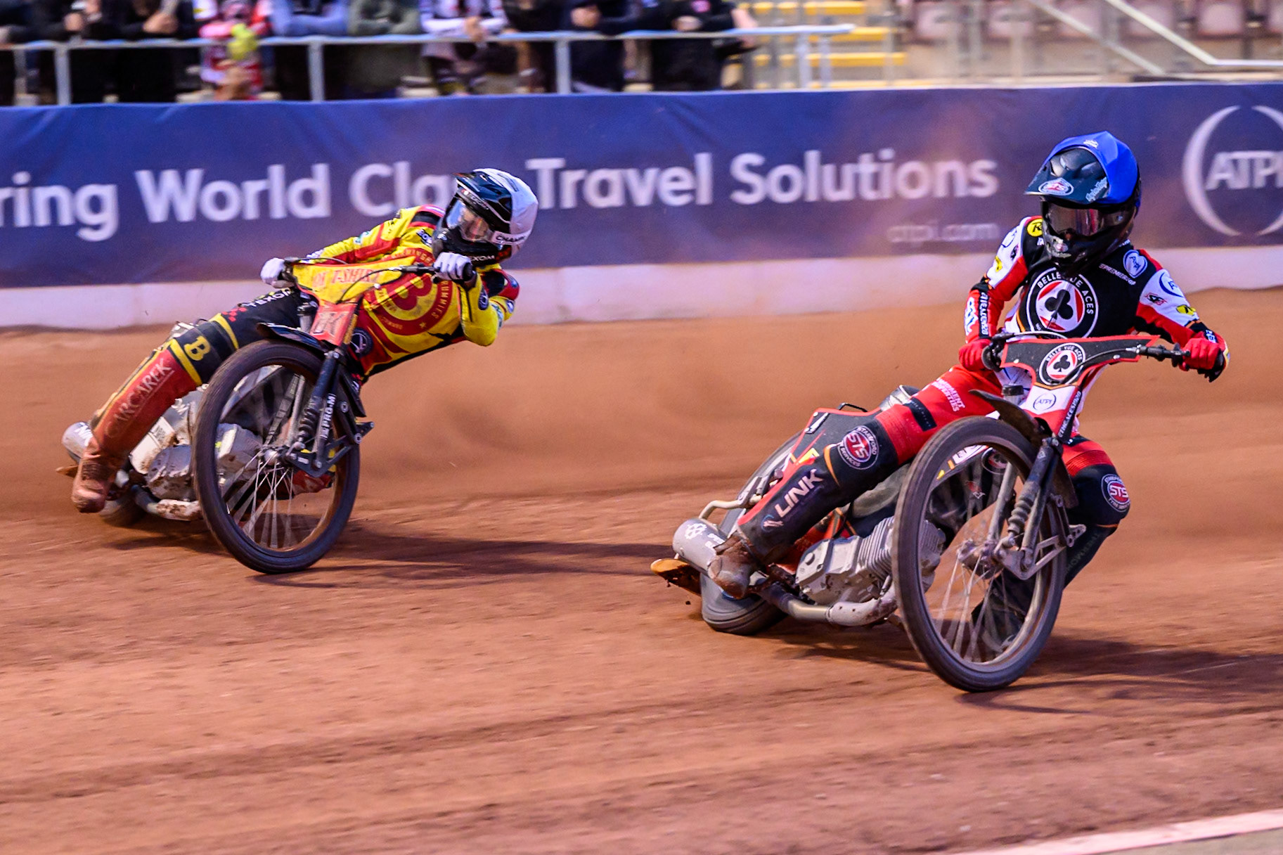 Belle Vue Aces' Zach Cook  in Blue rides inside Birmingham Brummies' Tobias Musielak  in White during the Rowe Motor Oil Premiership match between Belle Vue Aces and Birmingham Brummies at the National Speedway Stadium, Manchester on Monday 7th July 2025. (Photo: Ian Charles | MI News)