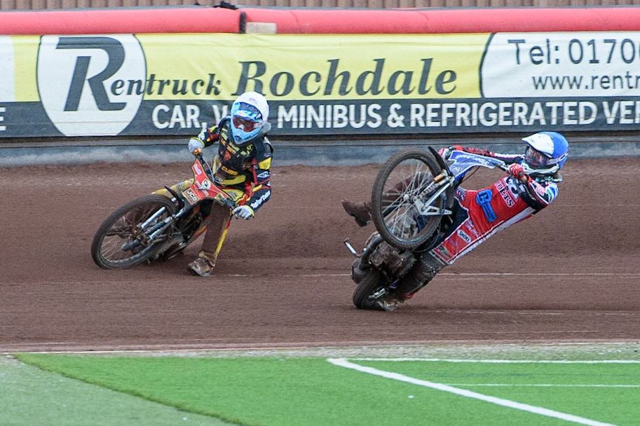 MANCHESTER, UK. JULY 29TH   Harry McGurk (Blue) picks up some drive and falls during the National Development League match between Belle Vue Colts and Leicester Lion Cubs at the National Speedway Stadium, Manchester on Thursday 29th July 2021. (Credit: Ian Charles | MI News)