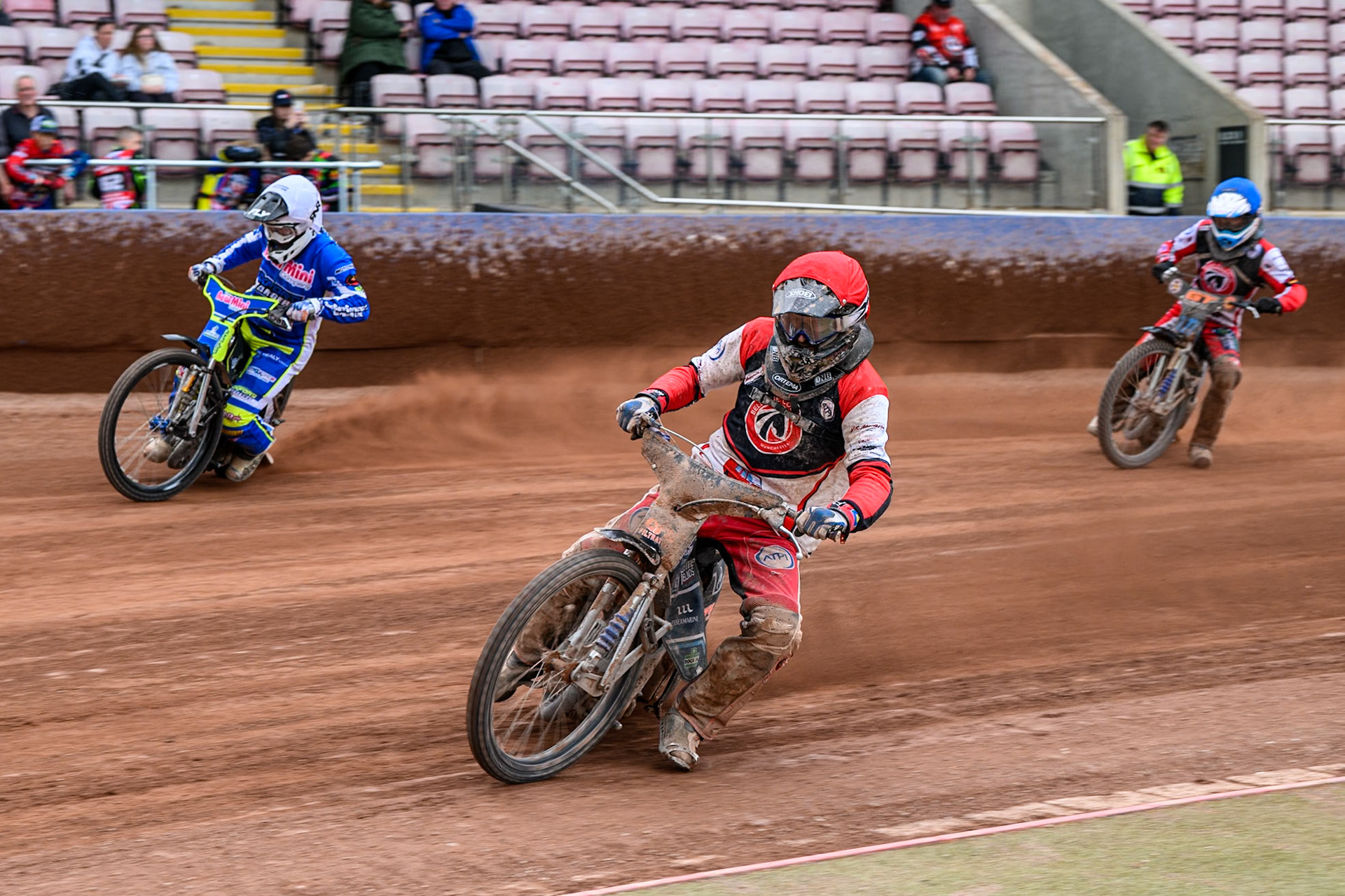 Belle Vue Colts' Jack Kingston  in Red rides inside Oxford Chargers' Arran Butcher  in White during the WSRA National Development League match between Belle Vue Colts and Oxford Chargers at the National Speedway Stadium, Manchester on Sunday 1st June 2025. (Photo: Ian Charles | MI News)