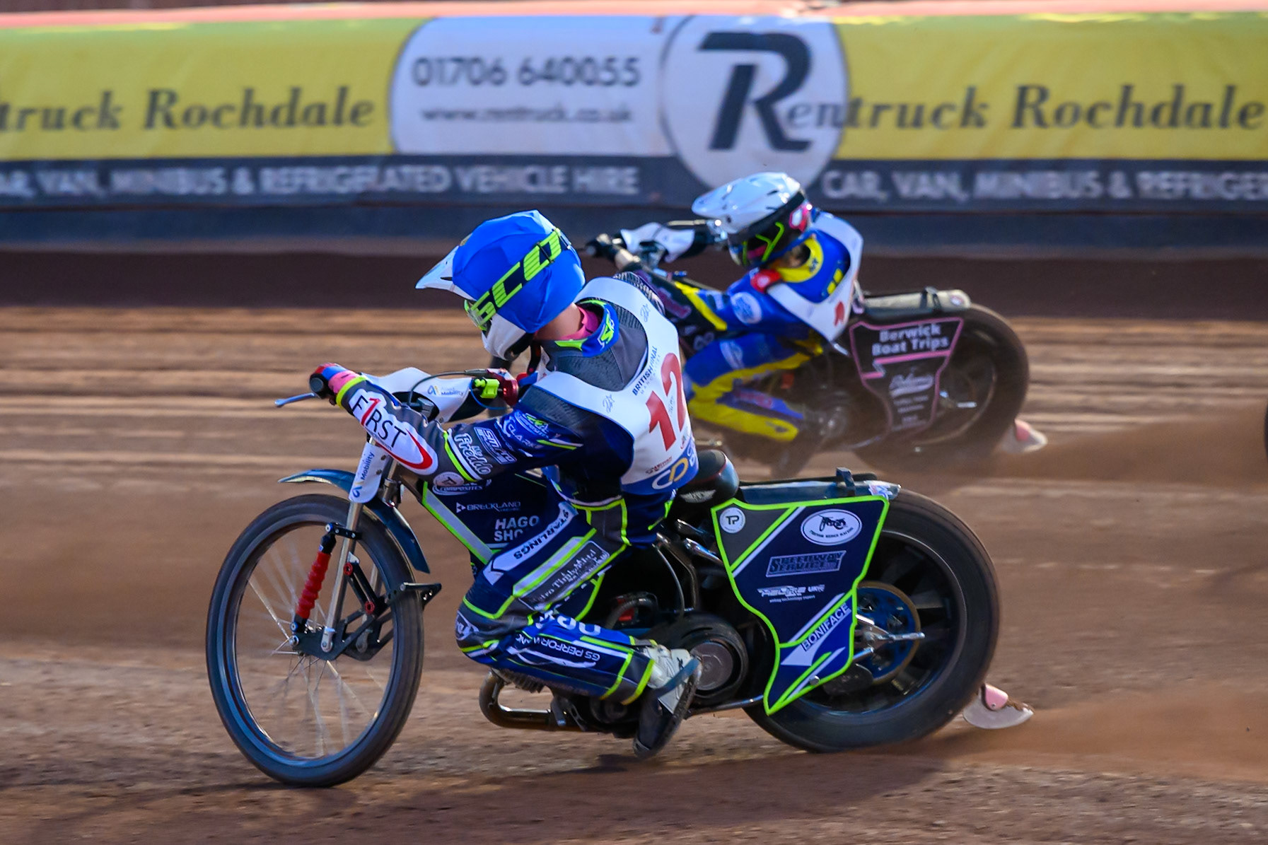 Jake Mulford (12) in Blue rides inside Leon Flint (14) in Yellow during the Cab Direct British Speedway Championship Final at the National Speedway Stadium, Manchester on Saturday 15th August 2026. (Photo: Ian Charles | MI News)