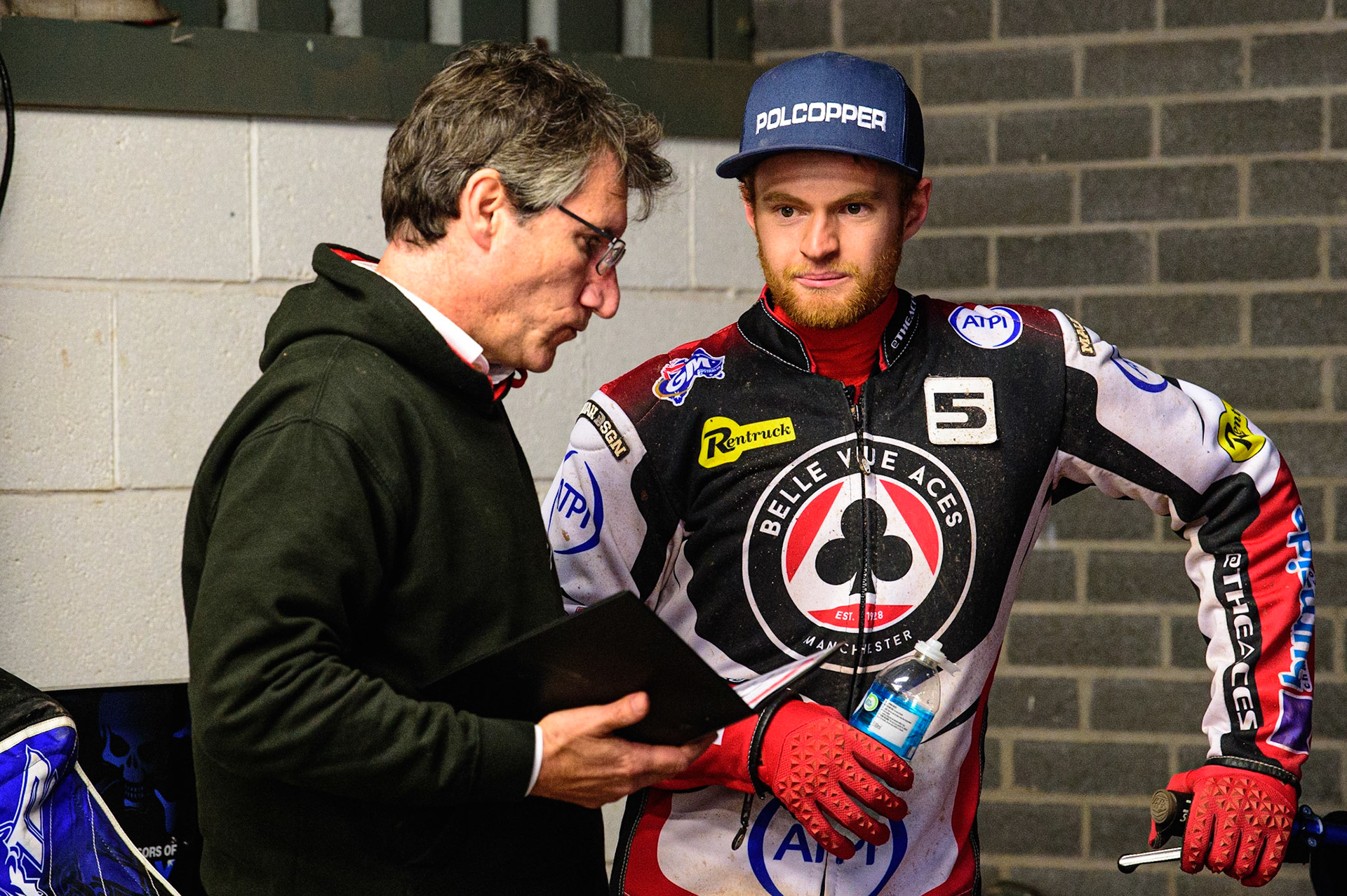 MANCHESTER, UK. JUN 6TH  Belle Vue ATPI Aces team manager Mark Lemon   (left) with Brady Kurtz  during the SGB Premiership match between Belle Vue Aces and Ipswich Witches at the National Speedway Stadium, Manchester on Monday 6th June 2022. (Credit: Ian Charles | MI News)