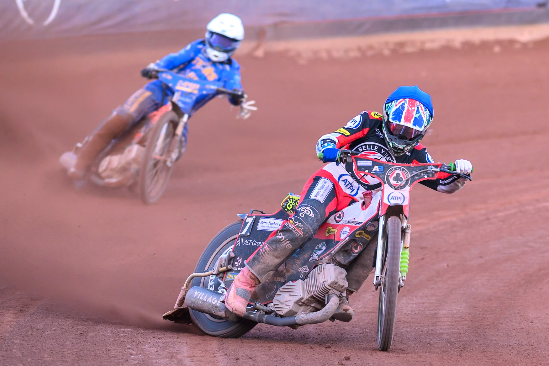 William Cairns of Belle Vue Aces in Blue leading Cooper Rushen of Kings Lynn Stars in White during the Rowe Motor Oil Premiership match between Belle Vue Aces and King's Lynn Stars at the National Speedway Stadium, Manchester on Monday 10th August 2026. (Photo: Ian Charles | MI News)