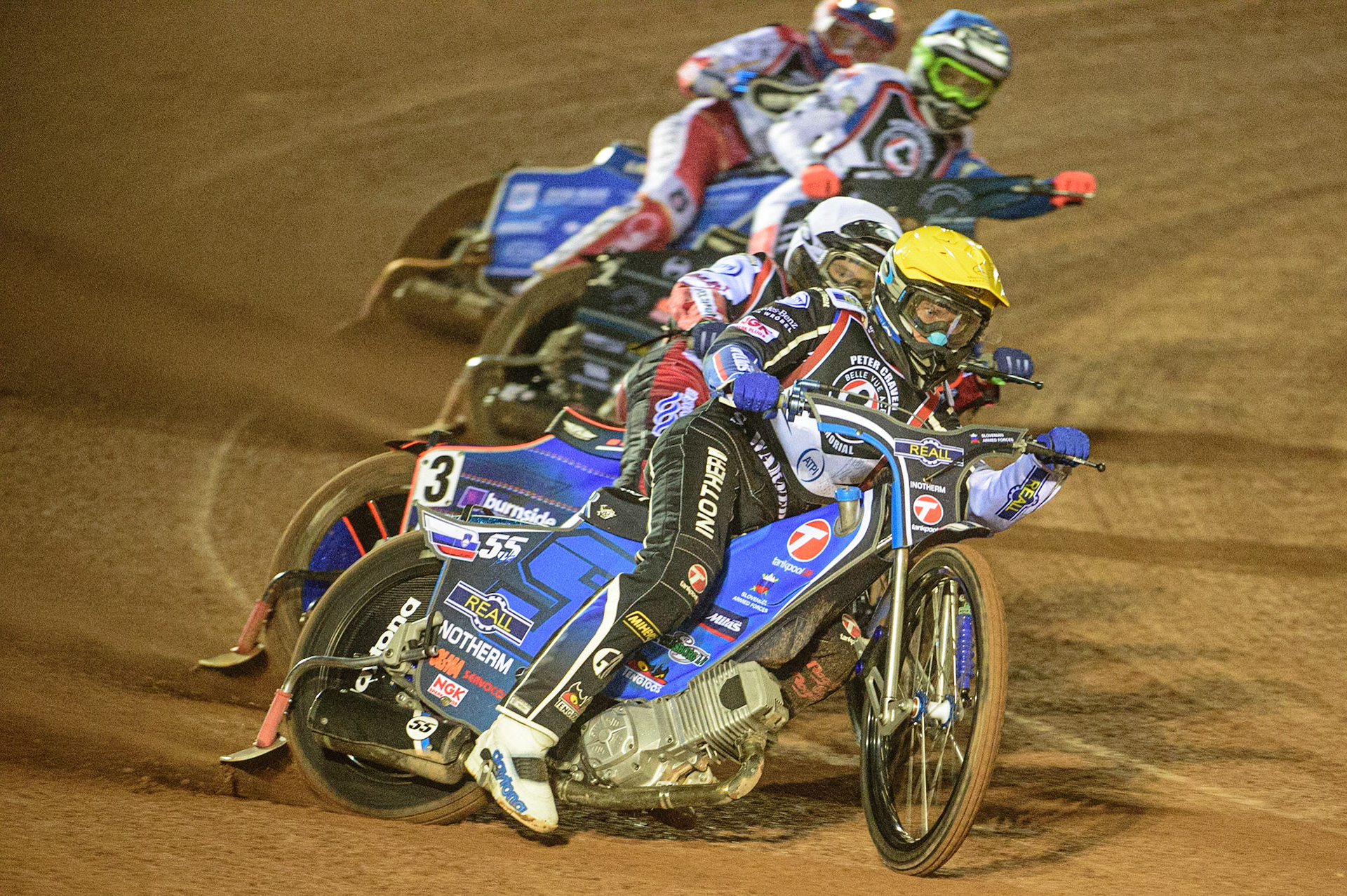 MANCHESTER, UK. MAR 21ST. Matej Žagar  (Yellow) leads Brady Kurtz (White), Adam Ellis  (Yellow) and Tobiasz Musielak (Red) during the ATPI Peter Craven Memorial Trophy at the National Speedway Stadium, Manchester on Monday 21st March 2022. (Credit: Ian Charles | MI News)