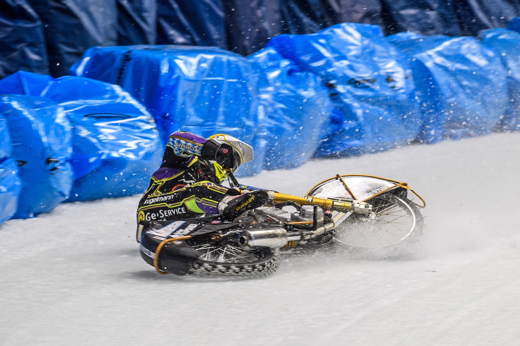Max Niedermaier  (88) of Germany spins off and hits the bales during the Ice Speedway Gladiators World Championship Final 1 at Max-Aicher-Arena, Inzell on Saturday 15th March 2025. (Photo: Ian Charles | MI News)