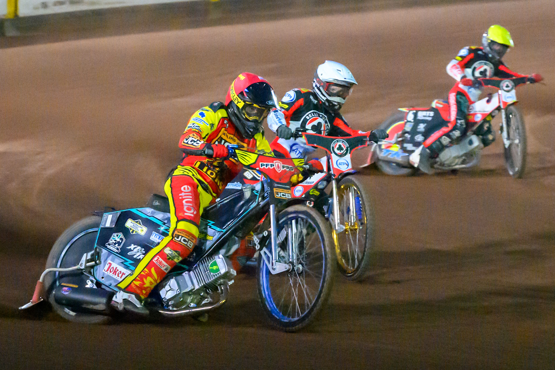 Ryan Douglas of Leicester Lions in Red rides outside Jason Doyle of Belle Vue Aces  in White  and Tate Zischke of Belle Vue Aces  in Yellow during the Rowe Motor Oil Premiership match between Leicester Lions and Belle Vue Aces at the Hydroscan Arena, Leicester on Monday 7th September 2026. (Photo: Ian Charles | MI News)