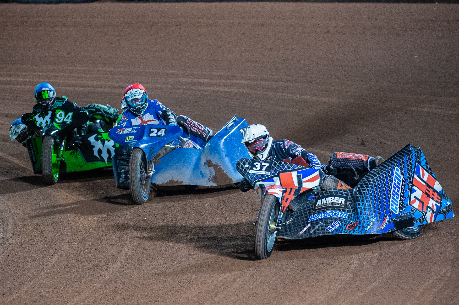 MANCHESTER, ENGLAND Mark Cossar & Carl Pugh (37) leads Rob Wilson & Terry Saunters (24) and Billy Winterburn & Ryan Wharton (94) during the  ACU Sidecar Speedway Manchester Masters,  Belle Vue National Speedway Stadium, Manchester Saturday 12 October 2019 (Credit: Ian Charles | MI News)