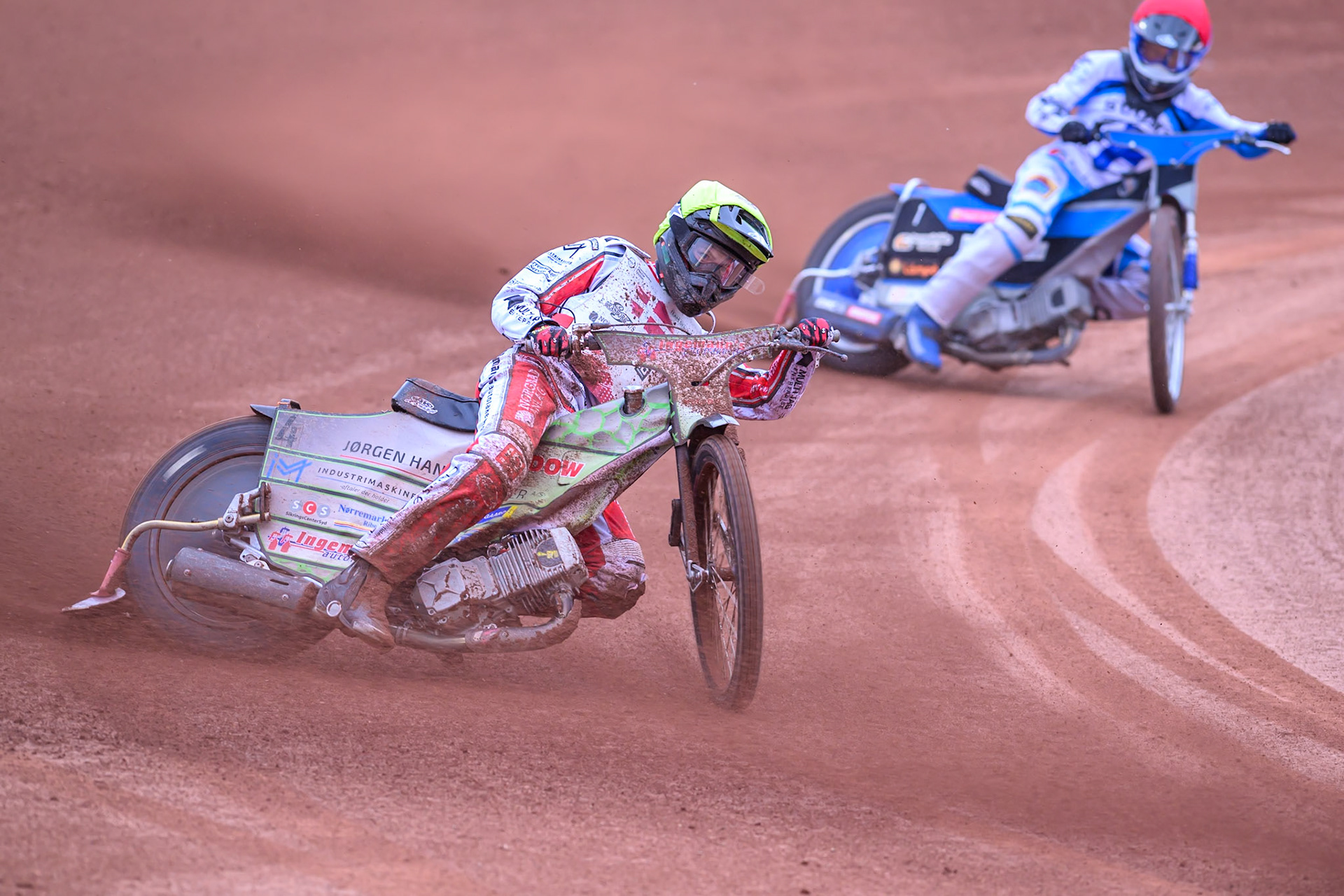 Jonas Knudsen of Denmark in Yellow leading Antti Vuolas of Finland in Red during the Speedway GP Qualifying Round 3 at Allied Ashfield Stadium, Glasgow on Saturday 30th May 2026. (Photo: Ian Charles | MI News)