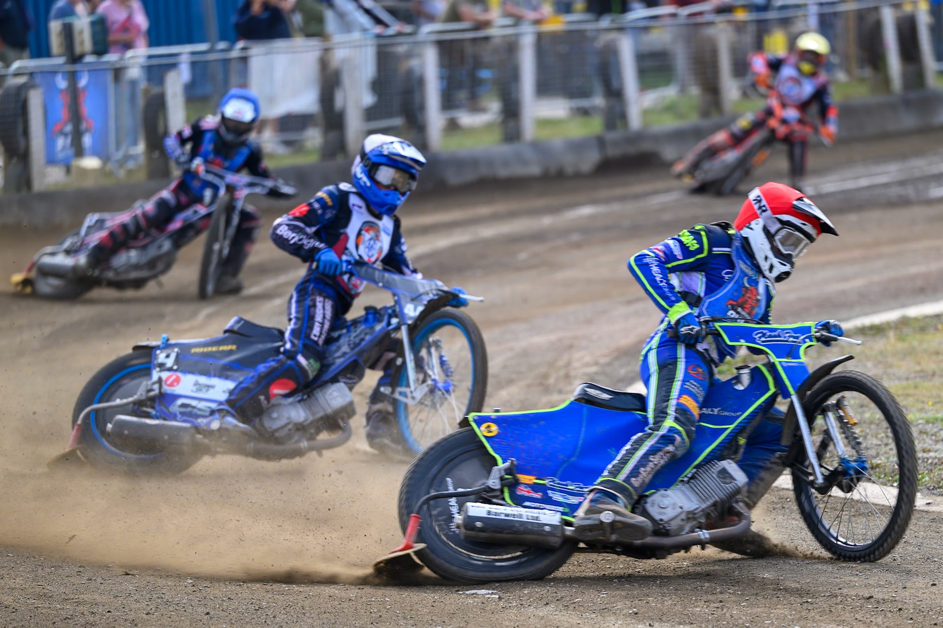 Arran Butcher of Buxton Bulls in Red leading Middlesbrough Tigers 4\in Yellow Jack Shimelt of Buxton Bulls in Blue  and Alex Spooner of Middlesborough Tigers in Yellow during the WSRA National Development League match  between Buxton Bulls and Middlesborough Tigers at Hi-Edge Speedway, Buxton on Sunday 16th August 2026. (Photo: Ian Charles | MI News)