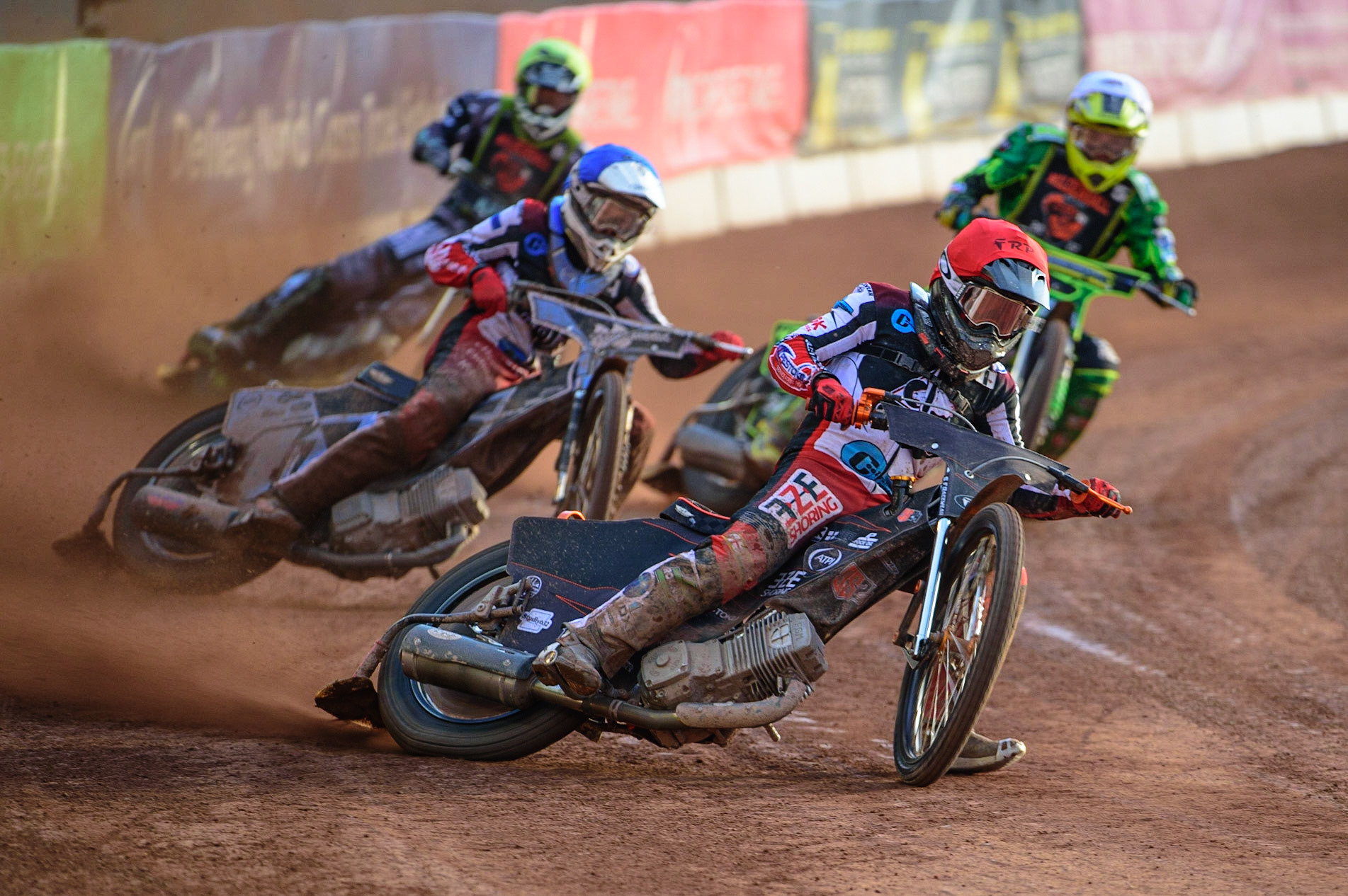 Jack Smith  (Red) leads Sam McGurk  (Blue)  Sam Bebee  (White), and Josh Warren  (Yellow) during the National Development League match between Belle Vue Colts and Mildenhall Fens Tigers at the National Speedway Stadium, Manchester on Friday 15th July 2022. (Credit: Ian Charles | MI News)