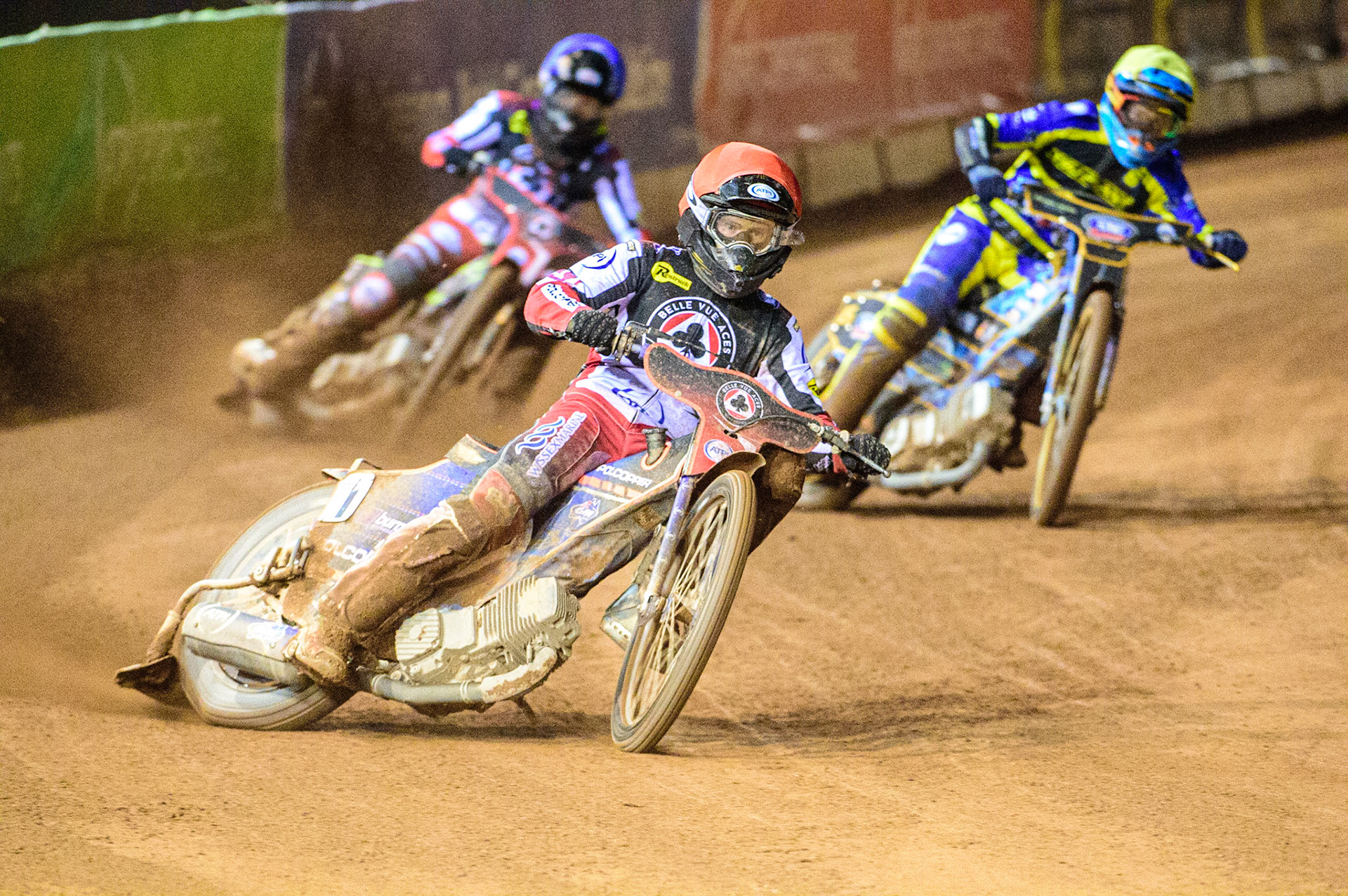 Brady Kurtz  (Red) leads Tom Brennan  (Blue) and Justin Sedgmen  (Yellow) during the SGB Premiership Grand Final 1st leg between Belle Vue Aces and Sheffield Tigers at the National Speedway Stadium, Manchester on Monday 10th October 2022. (Credit: Ian Charles | MI News)