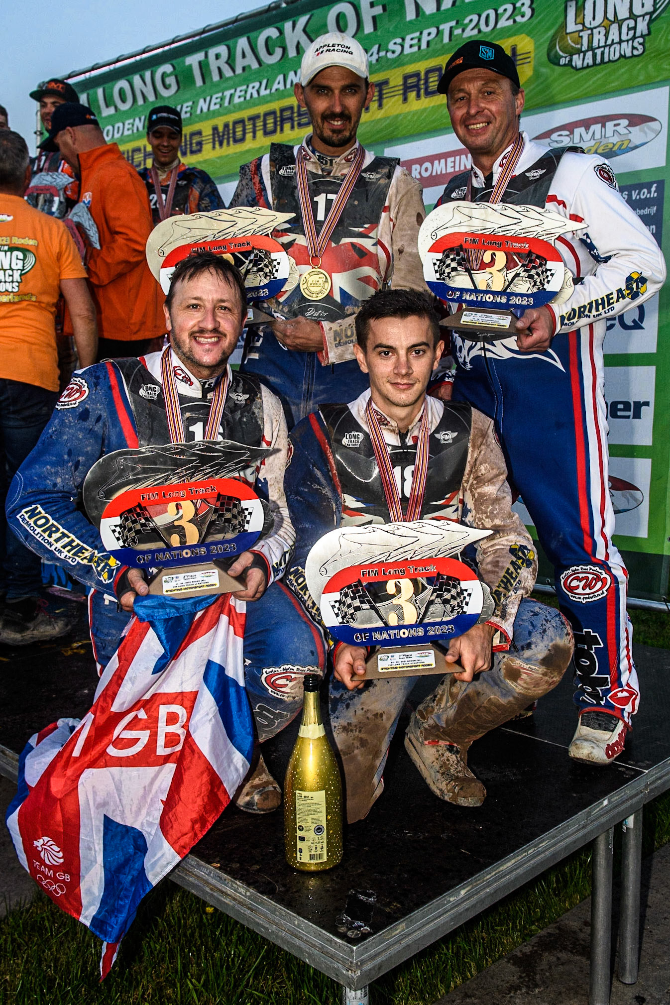 The Great Britain Team - 3rd place: Rear:(L to R) Andrew Appleton, Paul Hurry,Kneeling: Chris Harris, Zach Wajtknecht during the FIM Long Track Of Nations event at the Speed Centre Roden on Sunday 24th September 2023. (Photo: Ian Charles | MI News)
