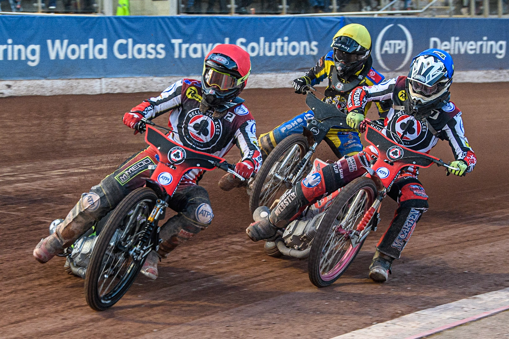 Tom Brennan (Red) leads Connor Bailey (Blue) and Dan Gilkes (Yellow) during the Sports Insure Premiership match between Belle Vue Aces and Sheffield Tigers at the National Speedway Stadium, Manchester on Monday 7th August 2023. (Photo: Ian Charles | MI News)