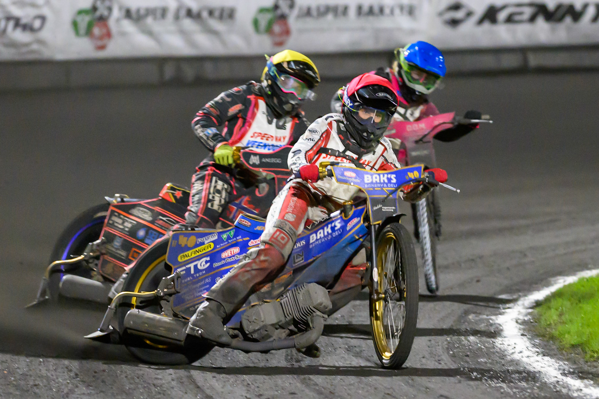 SEMI FINAL 1: Jacob D. Jensen of Denmark in Red leading Glenn Moi of Norway in Yellow  and Hannah Grunwald of Germany in Blue  during the Gouden KENNY Helm at Speedway Veenoord, Veenoord in the Netherlands on Saturday 19th September 2026. (Photo: Ian Charles | MI News)