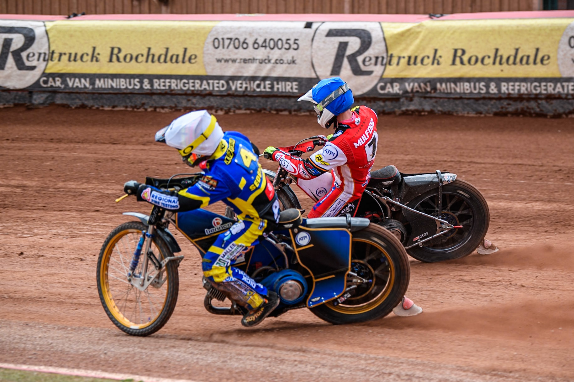 Justin Sedgmen of Sheffield Tigers in White rides inside Jake Mulford of Belle Vue Aces in Blue during the Rowe Motor Oil Premiership match between Belle Vue Aces and Sheffield Tigers at the National Speedway Stadium, Manchester on Monday 5th May 2025. (Photo: Ian Charles | MI News)