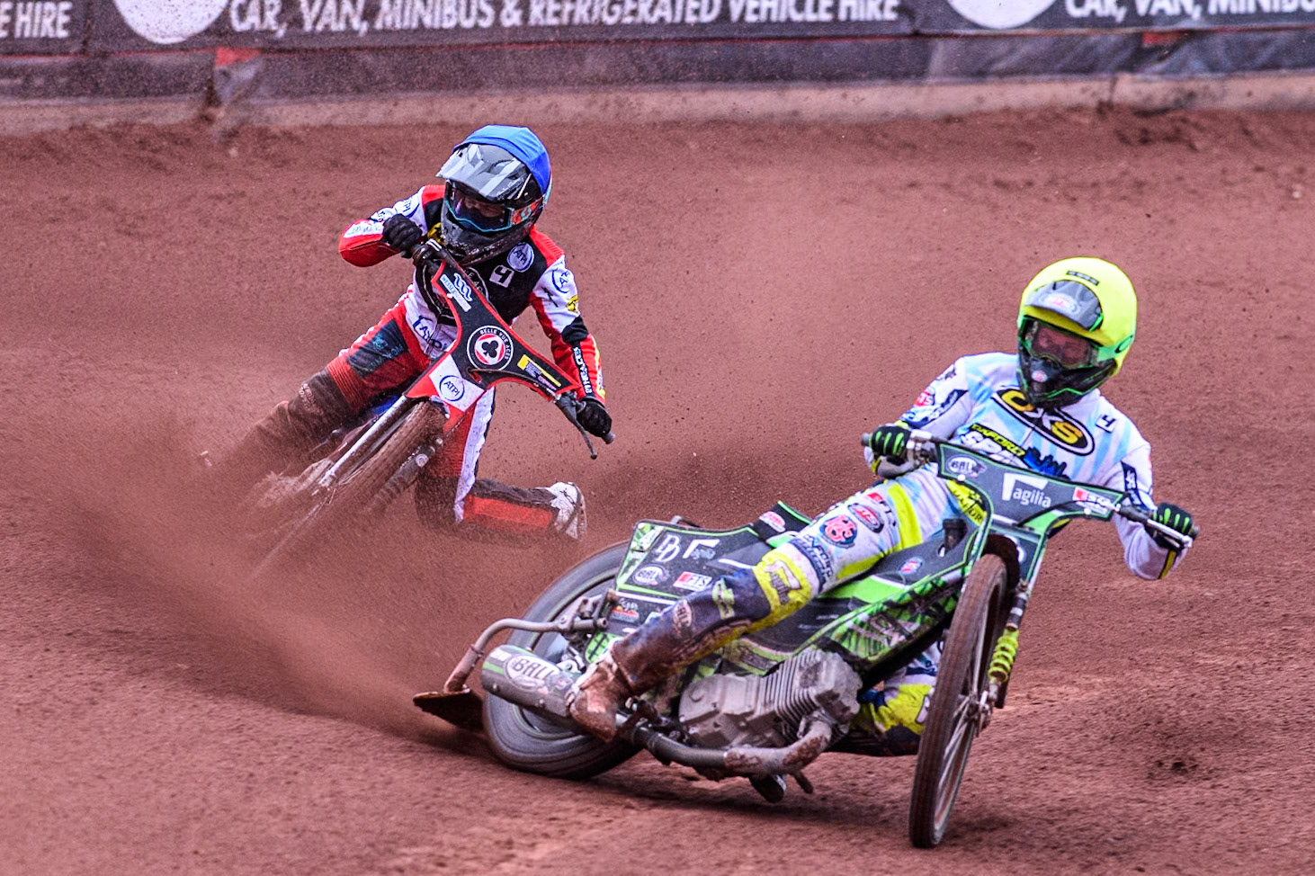 Belle Vue Aces' Ben Cook in Blue loses control after a tangle with Oxford Spires' Charles Wright in Yellow during the Rowe Motor Oil Premiership match between Belle Vue Aces and Oxford Spires at the National Speedway Stadium, Manchester on Monday 22nd July 2024. (Photo: Ian Charles | MI News)