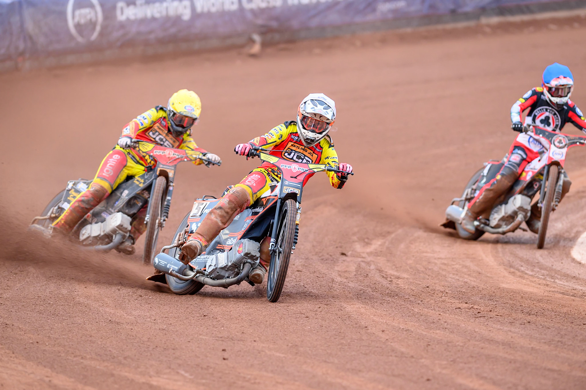 Sam Masters of Leicester Lions in White leading Kyle Howarth of Leicester Lions in Yellow and Zach Cook of Belle Vue Aces in Blue during the Rowe Motor Oil Premiership match between Belle Vue Aces and Leicester Lions at the National Speedway Stadium, Manchester on Monday 15th June 2026. (Photo: Ian Charles | MI News)