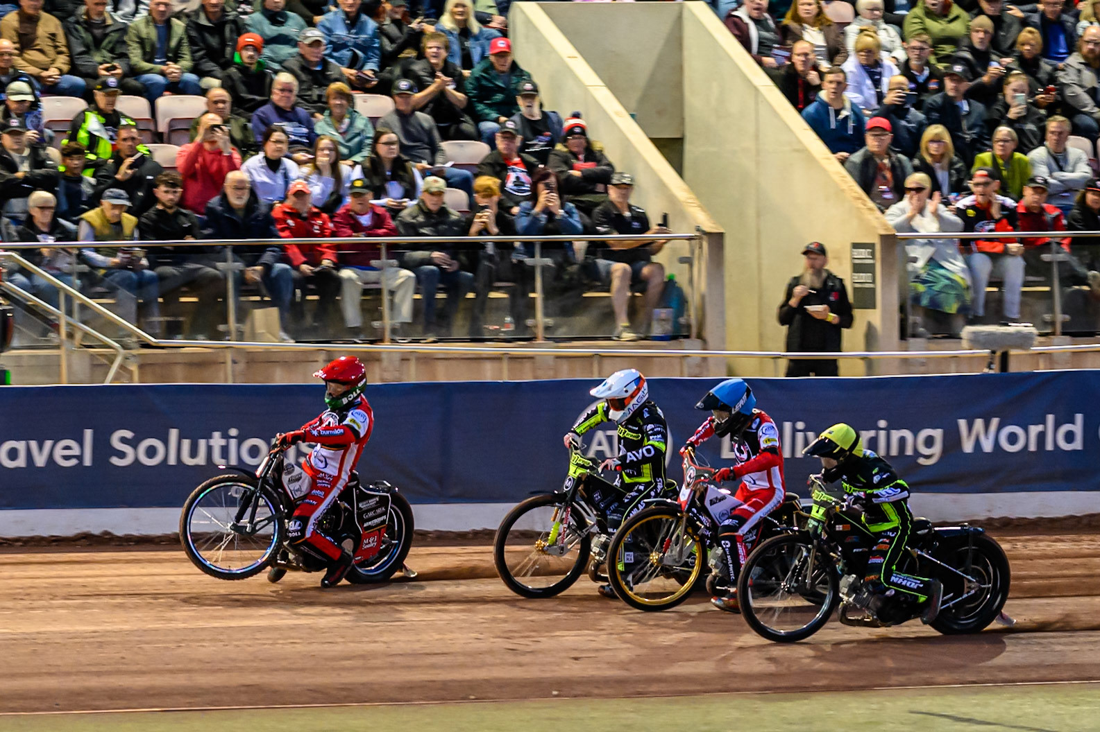 Brady Kurtz of Belle Vue Aces  in Red leading Emil Saifutdinov of Ipswich Witches  in White, Norick Blödorn of Belle Vue Aces  in Blue and Danny King of Ipswich Witches  in Yellow away from the start in heat 1 during the Rowe Motor Oil Premiership Play Off Semi Final 1 (1st Leg)  between Belle Vue Aces and Ipswich Witches at the National Speedway Stadium, Manchester on Monday 8th September 2025. (Photo: Ian Charles | MI News)