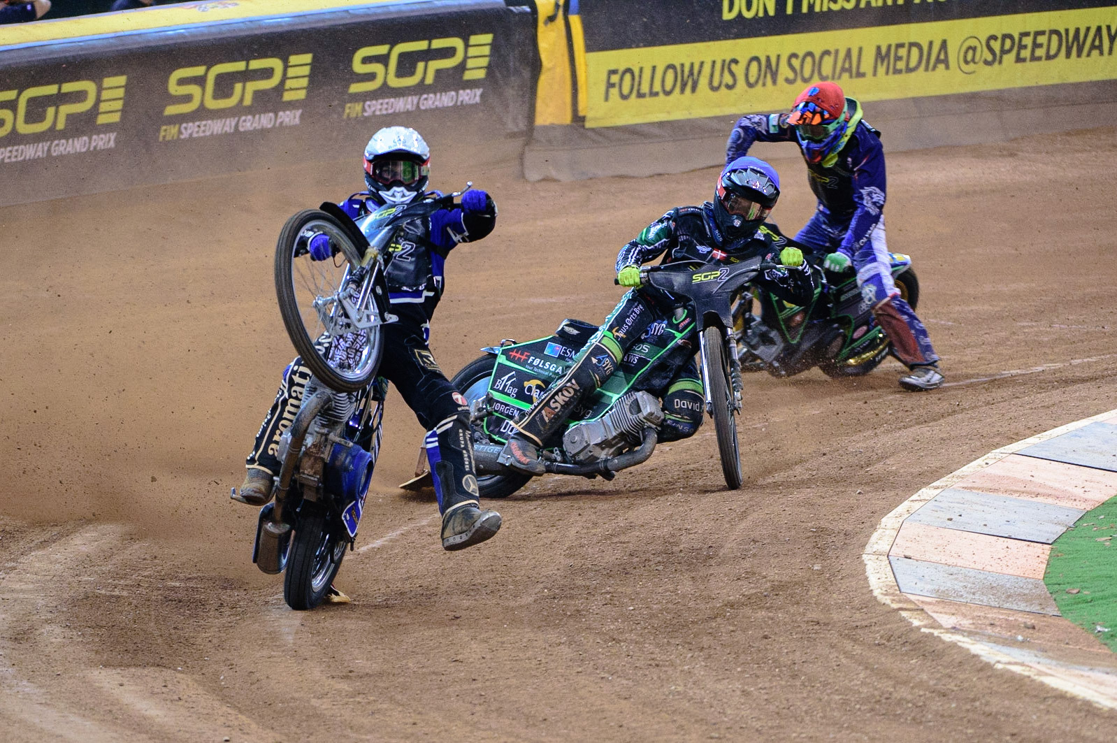 Jakub Miskowiak (Poland) (White) rears uncontrollably with Jonas Knudsen (Denmark)  (Blue) and Daniel Klima (Czech Republic) (Red) behind during the FIM  Speedway Grand Prix  2 of Great Britain at the Principality Stadium, Cardiff on Sunday 14th August 2022. (Credit: Ian Charles | MI News)