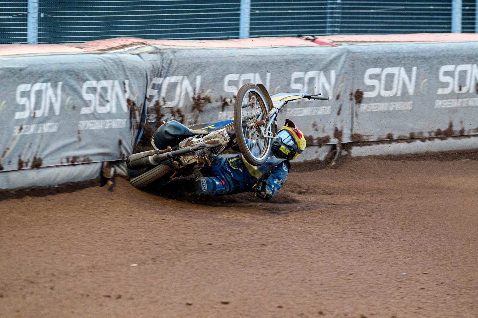Marko Levishyn of Ukraine in Yellow crashes out of his final heat during the Monster Energy FIM Speedway of Nations Semi-Final 1 at the National Speedway Stadium, Manchester on Tuesday 9th July 2024. (Photo: Ian Charles | MI News)