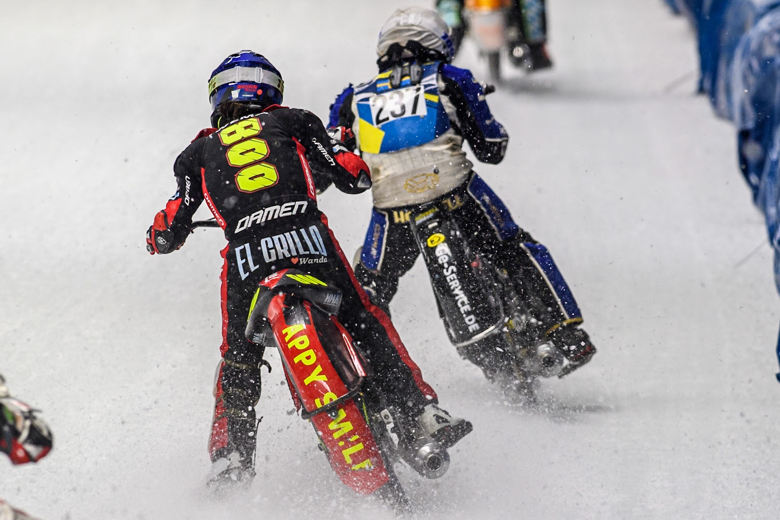 Netherlands' Jasper Iwema (800) (Blue) chases Sweden's Jimmy Hörnell Lidfalk (237) (White) during the FIM Ice Speedway Gladiators World Championship Final 2 at the Max-Aicher-Arena, Inzell on Sunday 24 March 2024. (Photo: Ian Charles | MI News)