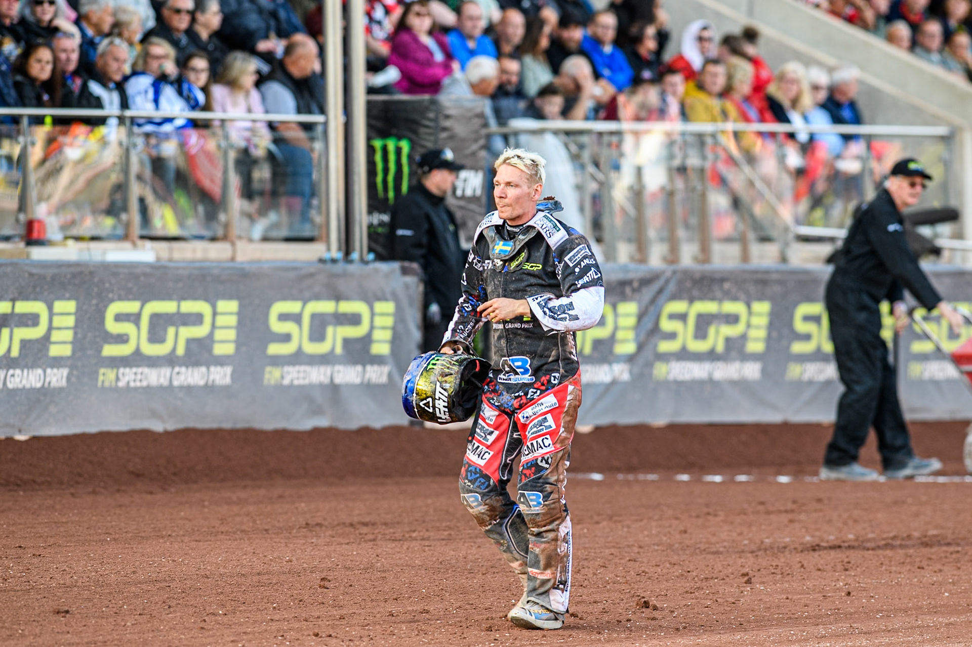 Fredrik Lindgren (66) of Sweden walks back to the pits after his crash with Brady Kurtz during the ATPI FIM Speedway Grand Prix Round 5 at the National Speedway Stadium, Manchester, on Saturday 14th June 2025. (Photo: Ian Charles | MI News)