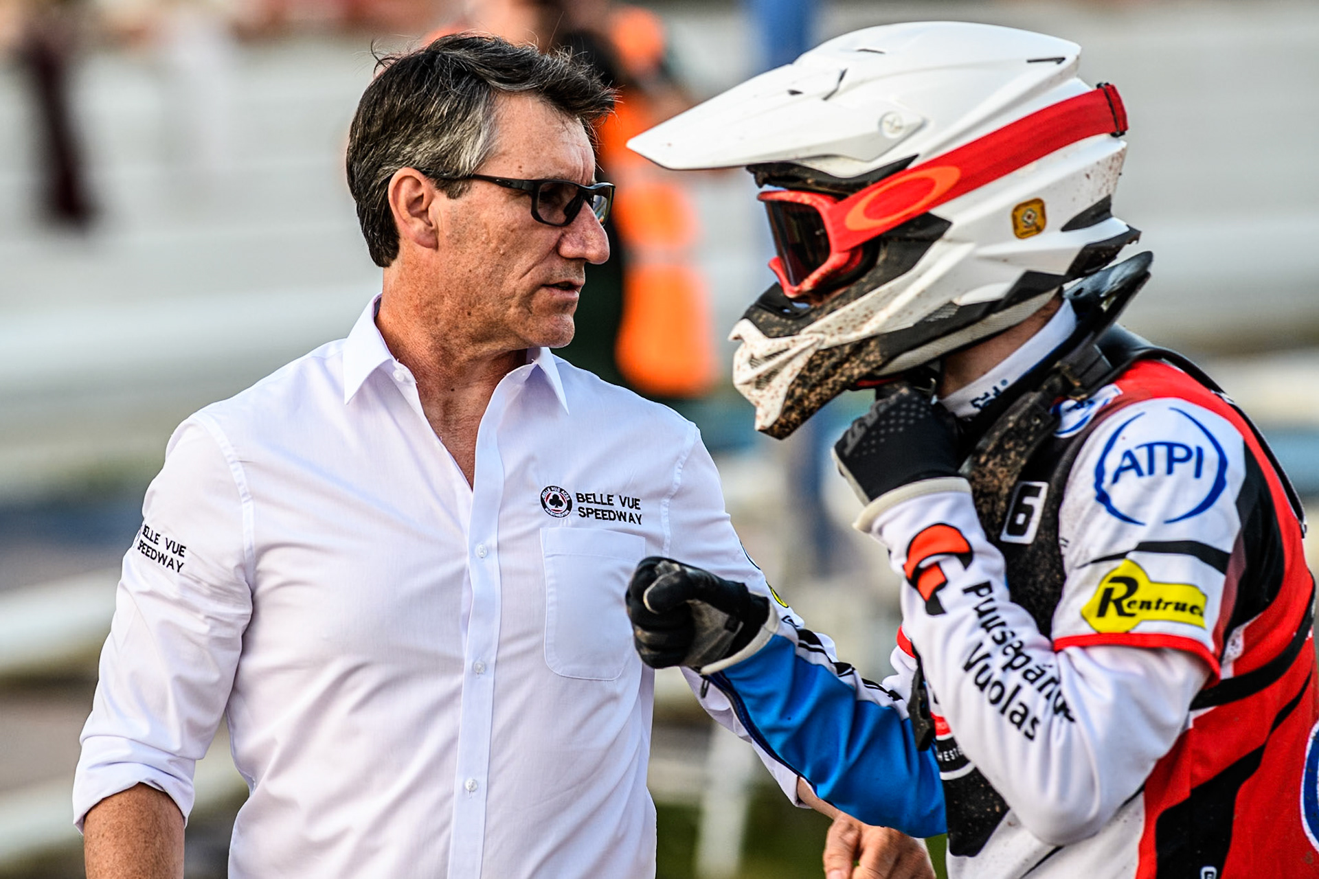 Belle Vue Aces' Team Manager Mark Lemon (Left) congratulates Belle Vue Aces' Antti Vuolas on his heat win during the Rowe Motor Oil Premiership match between Birmingham Brummies and Belle Vue Aces at Perry Bar Stadium, Birmingham on Monday 29th July 2024. (Photo: Ian Charles | MI News)