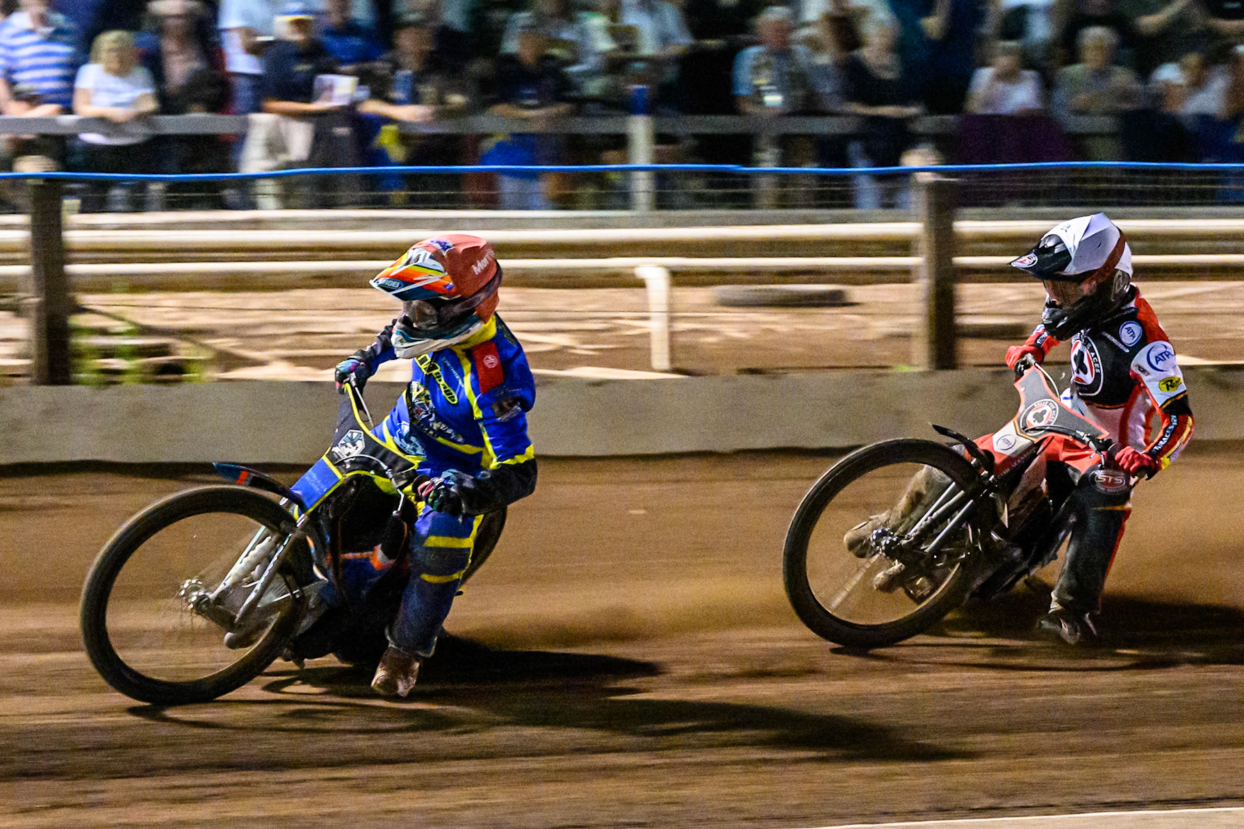 Nick Morris of Sheffield Tigers  in Red leading Zach Cook of Belle Vue Aces   in White  during the Rowe Motor Oil Premiership match between Sheffield Tigers and Belle Vue Aces at Owlerton Stadium, Sheffield on Monday 11th August 2025. (Photo: Ian Charles | MI News)