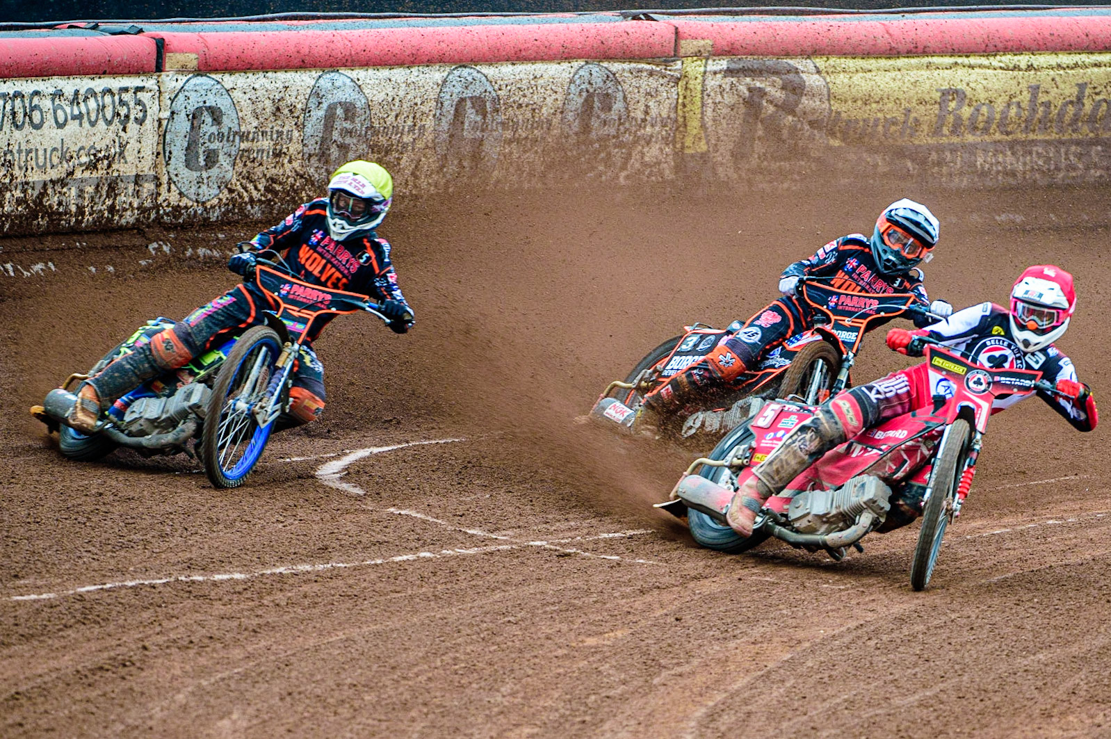 Max Fricke (Red) leads Luke Becker  (White) and Nick Morris  (Yellow) during the SGB Premiership match between Belle Vue Aces and Wolverhampton Wolves at the National Speedway Stadium, Manchester on Monday 29th August 2022. (Credit: Ian Charles | MI News)